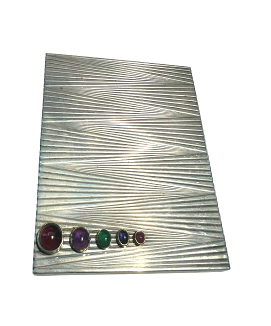 ANTIQUE RUSSIAN SILVER & CABACHON JEWELED CIG CASE: Measures 2 1/2 x 3 1/2 very very heavy with cabachon ruby, emerald, amethyst onyx and sapphire, mounted inside the silver. the inside is gold washed and in magnificent condition, aprox 9 ozt