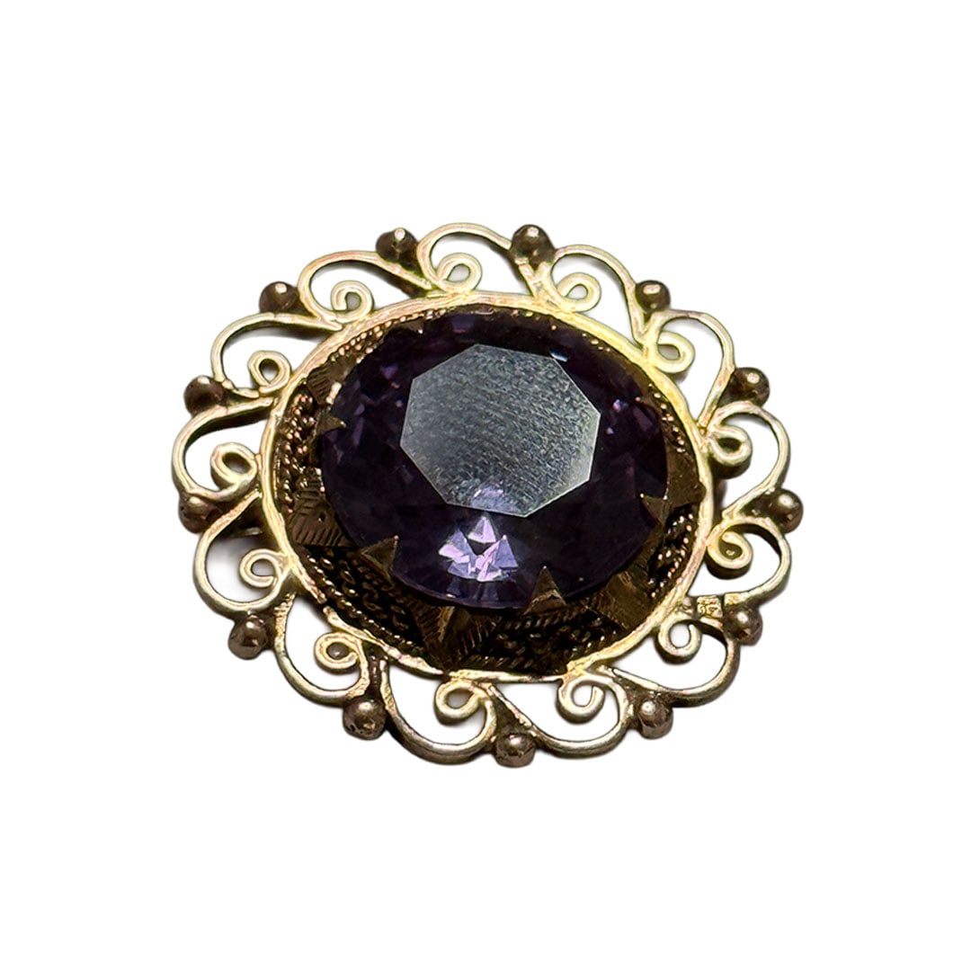 VINTAGE 14KT YELLOW GOLD AMETHYST LADIES FILIGREE BROOCH: Appears to be Greek in origin, about 1" in diameter, with lovely brilliant amethyst center stone, from a Palm Beach socialite, total weight 6.85 dwt