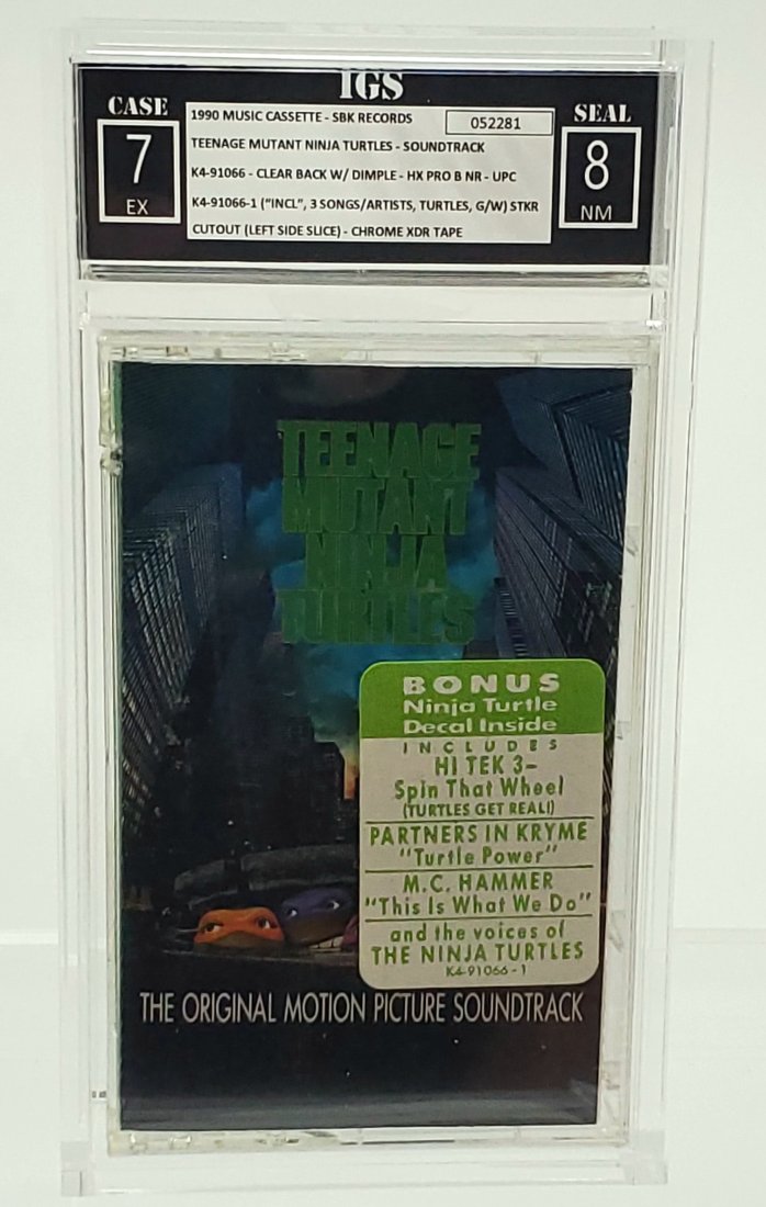 IGS 1990 7-8 TEENAGE MUTANT NINJA TURTLES SOUNDTRACK Sealed Graded Cassette Tape - Music: This early print showcases a "hype sticker", often found on initial music releases. It's worth mentioning that while most music releases usually have only one original hype sticker on the cover, there