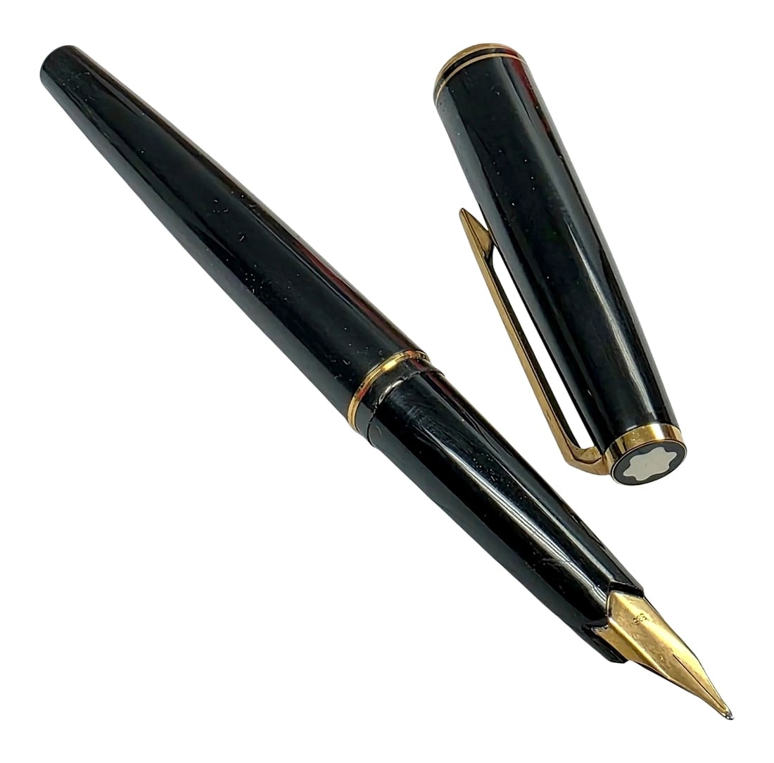 Vintage Montblanc Fountain Pen with 14K Gold Wing Nib: A vintage Montblanc fountain pen featuring a glossy black finish, gold-tone cap clip and accent bands, an amber-toned ink inspection window, and the iconic white Montblanc snowcap star emblem on the c