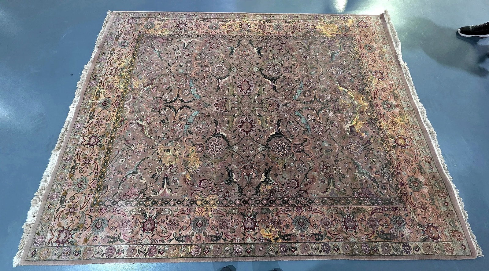 Persian Style Floral Palmette Square Area Rug: Square area rug designed in a traditional Persian floral style. The central field displays an all-over repeating network of scrolling vines, palmettes, and foliate motifs within a coordinating wide