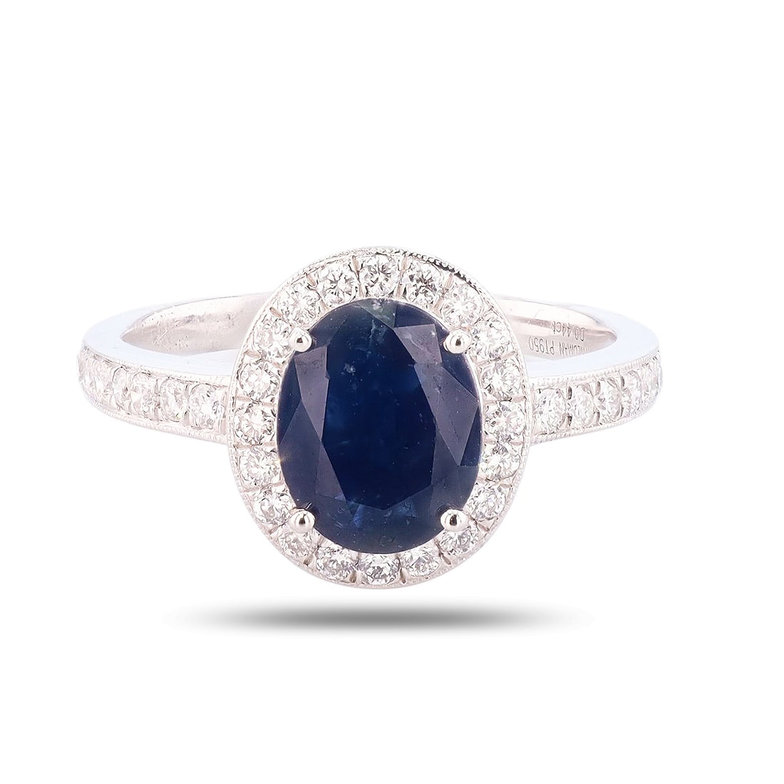 1.78ct Blue Sapphire and 0.44ctw Diamond Platinum Ring: Platinum (PLAT) natural sapphire corundum and diamond ring. An oval brilliant cut natural blue sapphire corundum gemstone is mounted in the center of the ring. Round brilliant cut diamonds accent the 