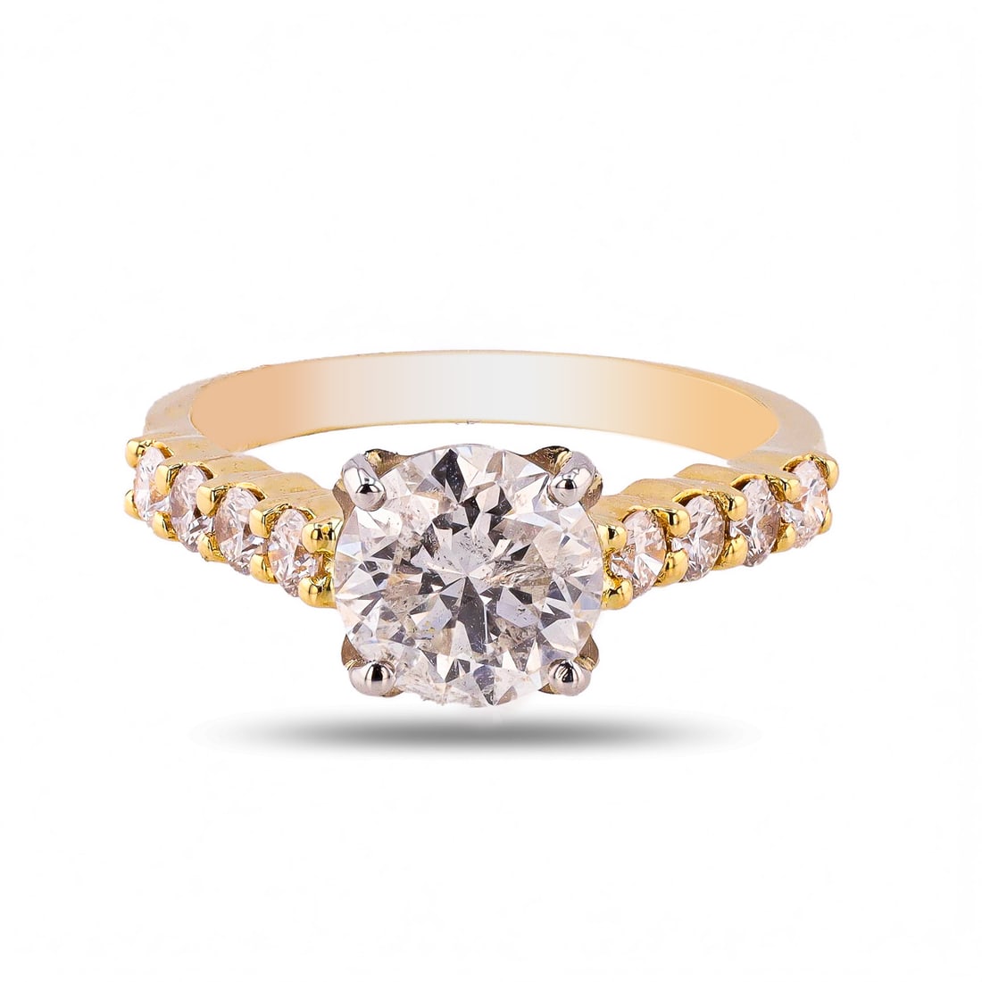 1.61ct H COLOR I1 CLARITY CENTER Diamond 18K Yellow & White Gold Solitaire Ring: Eighteen karat (18K) two tone gold round brilliant cut diamond ring. A round brilliant cut diamond is mounted in the center of the ring. Round brilliant cut diamonds accent the ring on both sides of t
