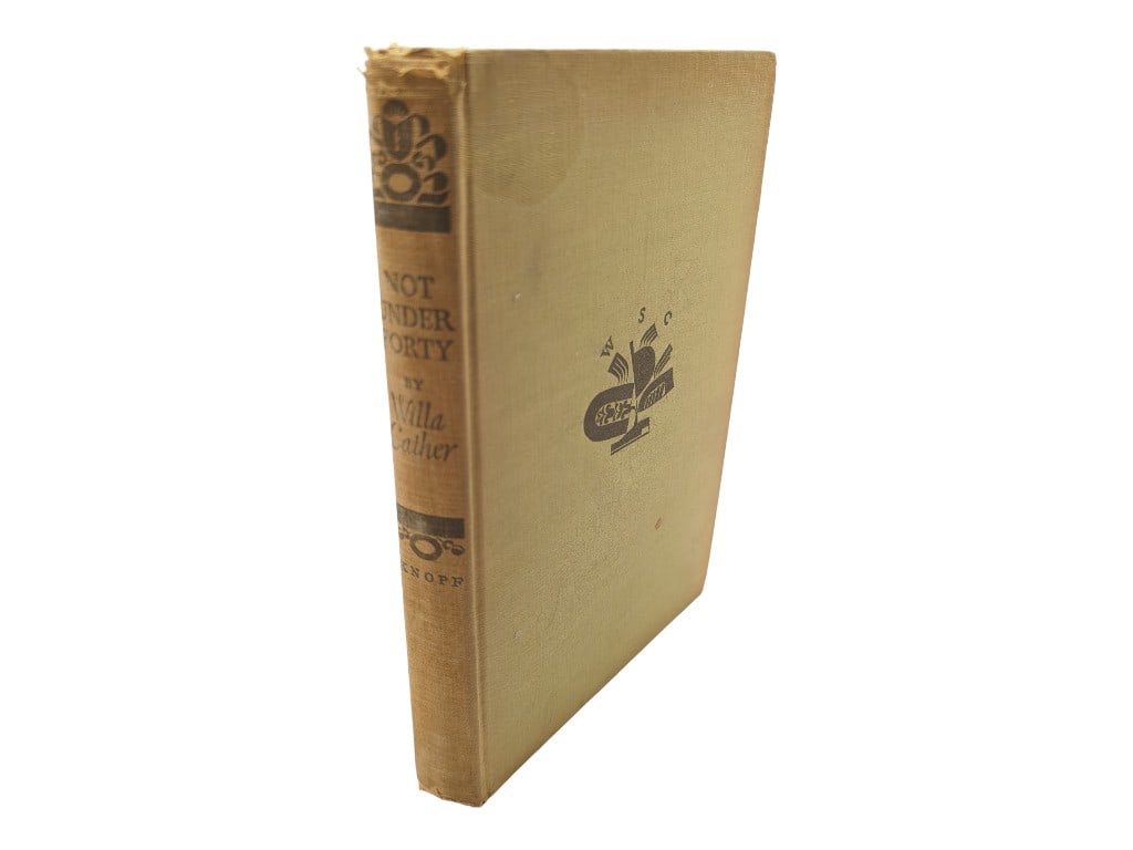 Not Under Forty by Willa Cather 1936: Book is in fair condition with blemishes on the cover, foxing and possible small handwritten inscription. Pages are legible and can be turned. Spine is attached.