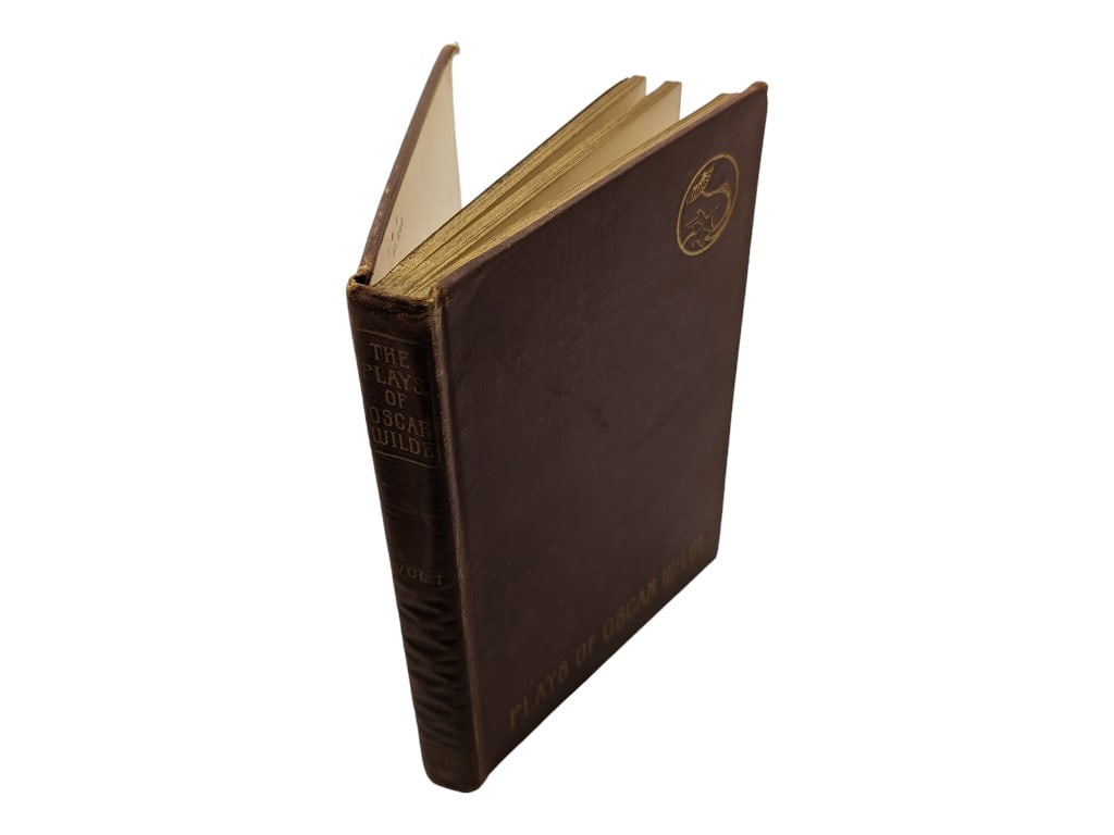 Plays of Oscar Wilde Vol. I 1905: Book is in fair condition with blemishes on the cover, foxing and possible small handwritten inscription. Pages are legible and can be turned. Spine is attached.
