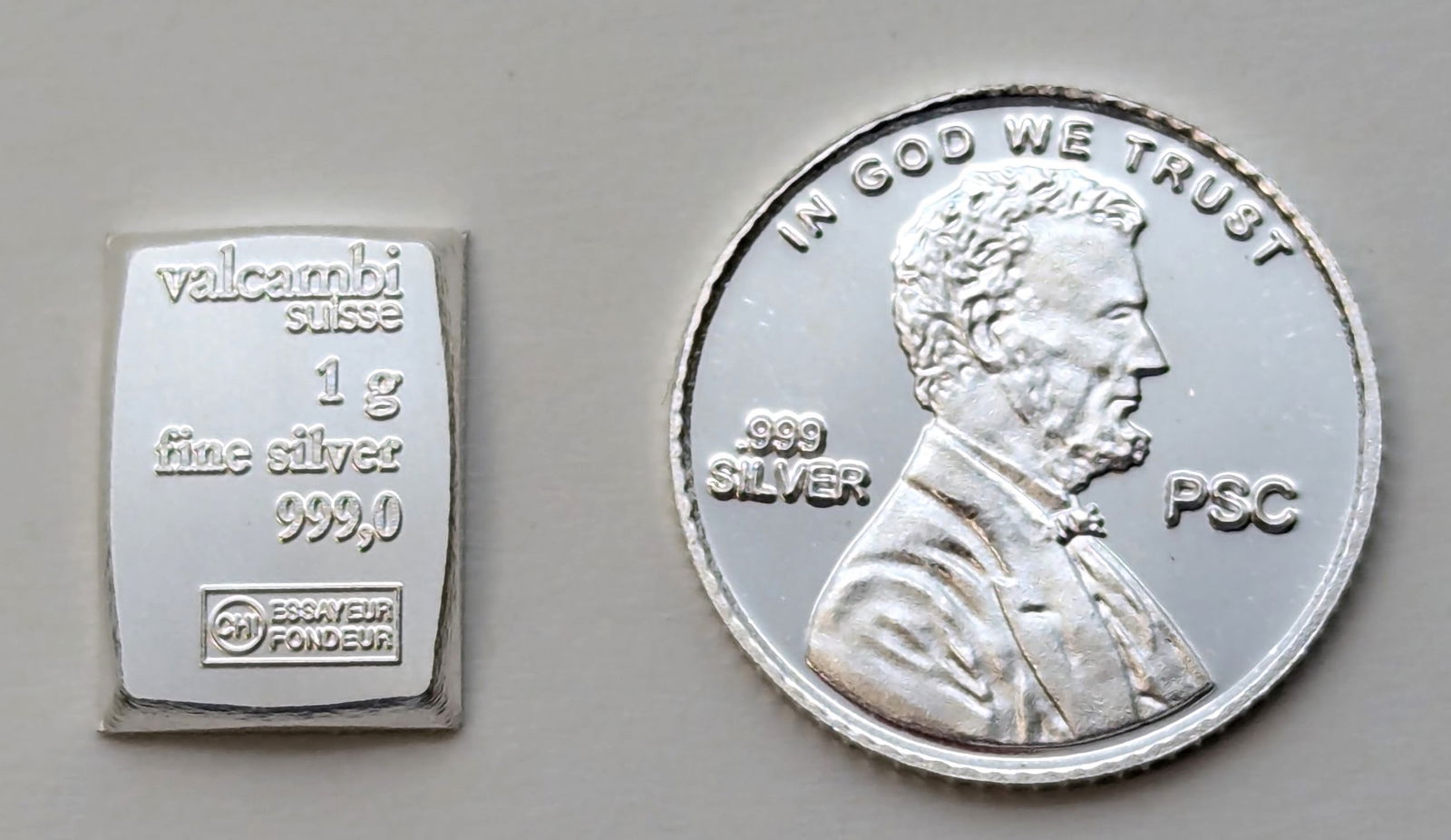 Lot of 2, 1-Gram Silver. Valcambi Bar and Silver round (1 of 2)