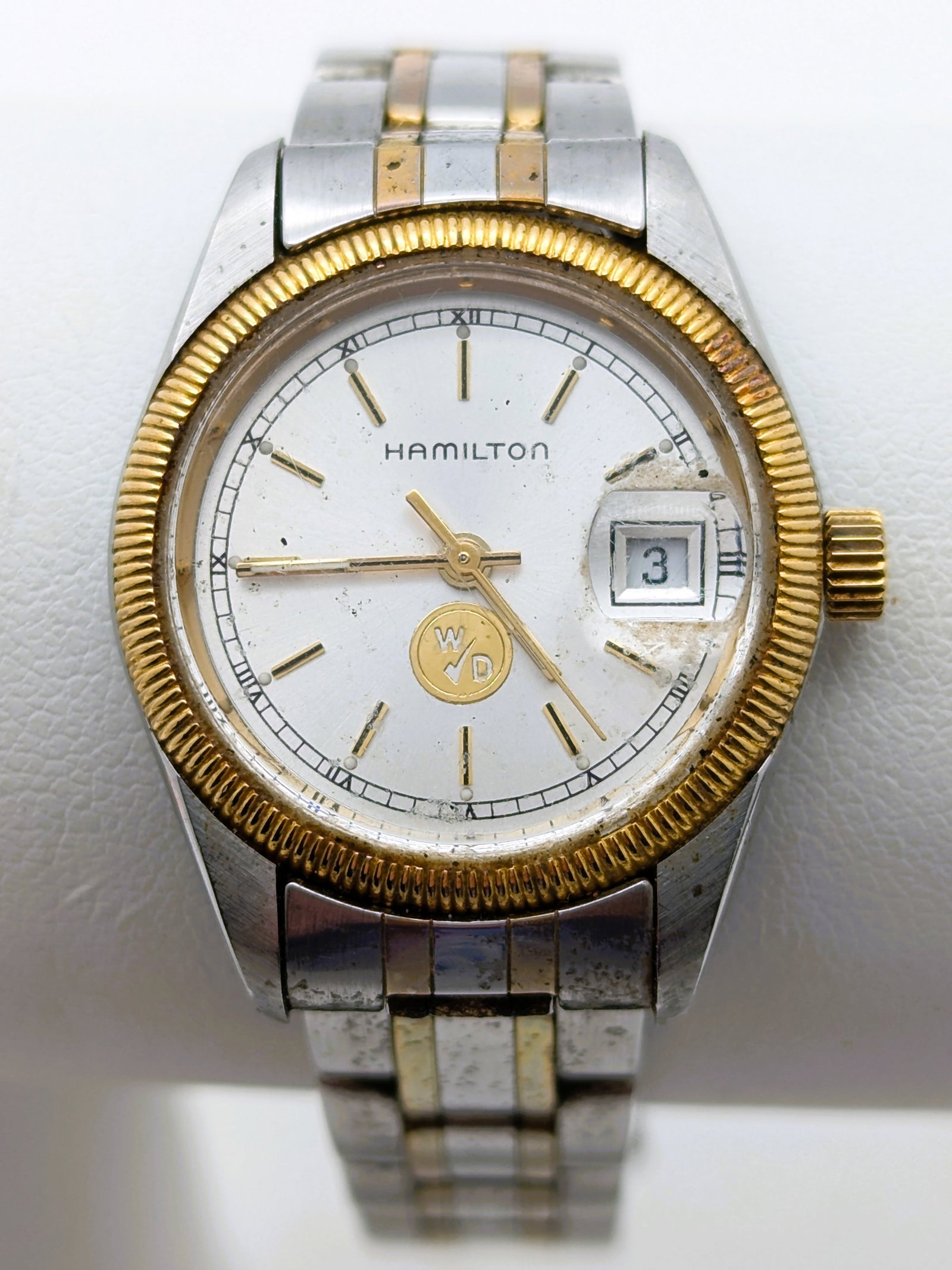 Vintage Hamilton Date Quartz Watch: Watch is running and keeping time well. Inscribed on back for years of service with Winn Dixie.