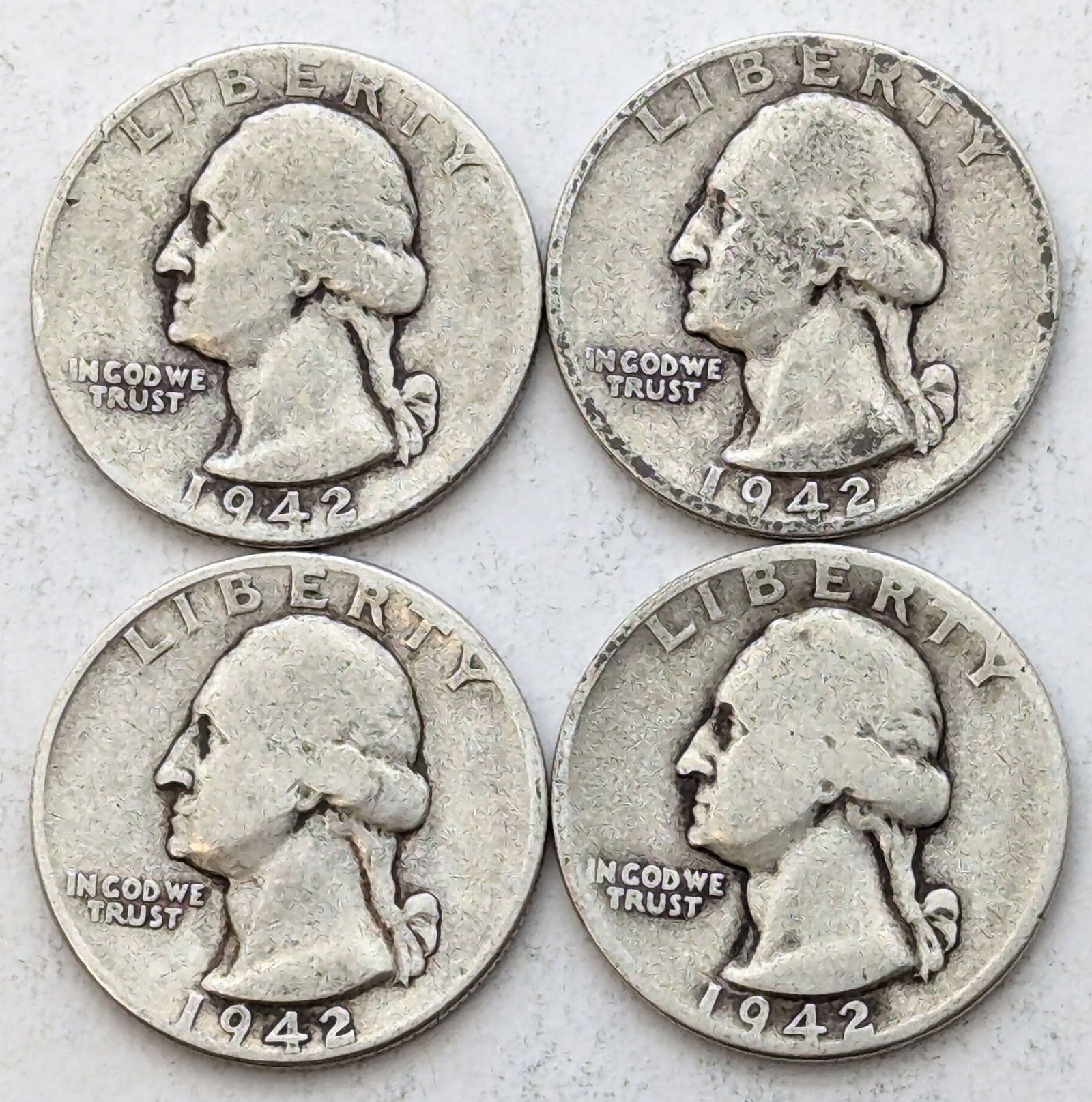 Lot of 4 Silver 1942 Washington Quarters (1 of 2)