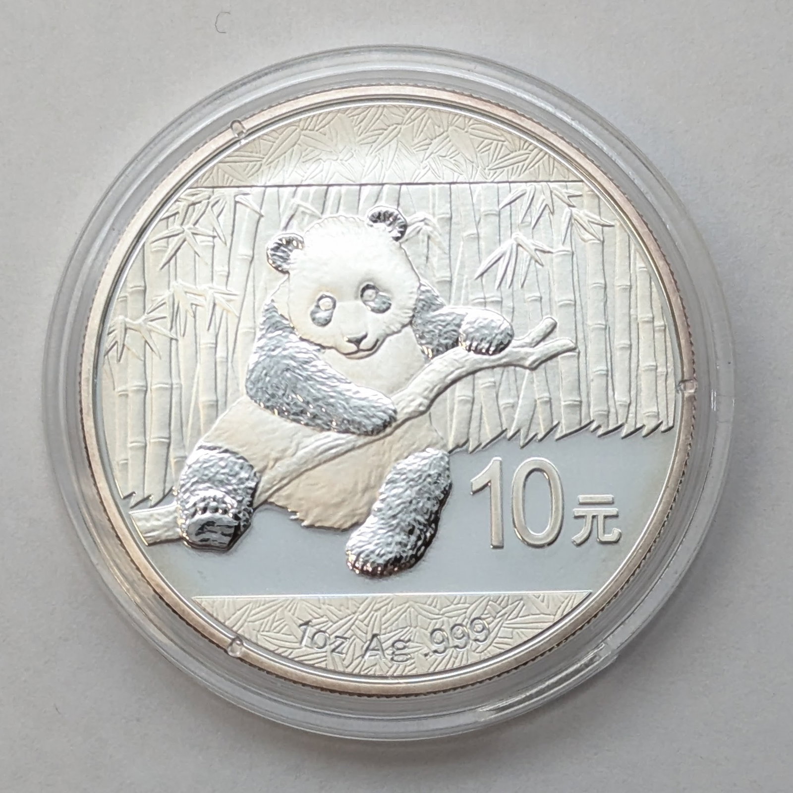 1 Ounce Fine .999 Silver Round 2014 Chinese Silver Panda: _