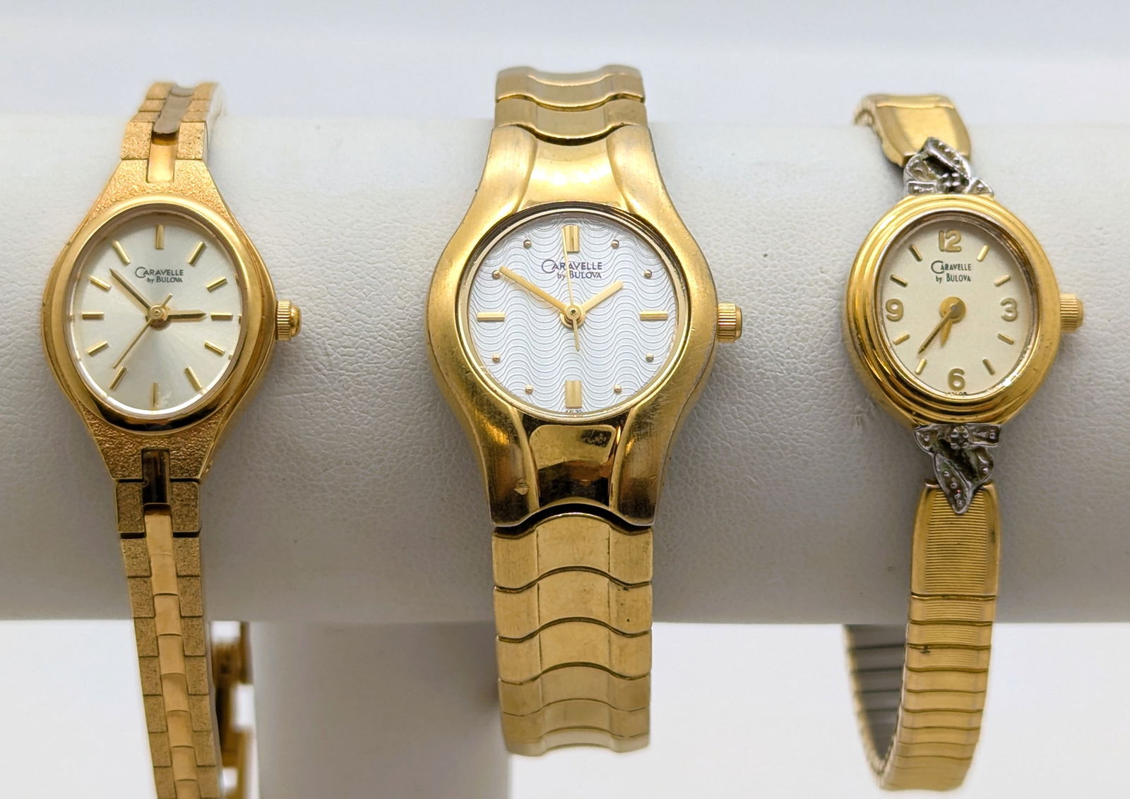 Lot of 3 Caravelle by Bulova Gold tone Quartz Ladies Watches: Not inspected. Appears to need replacement batteries