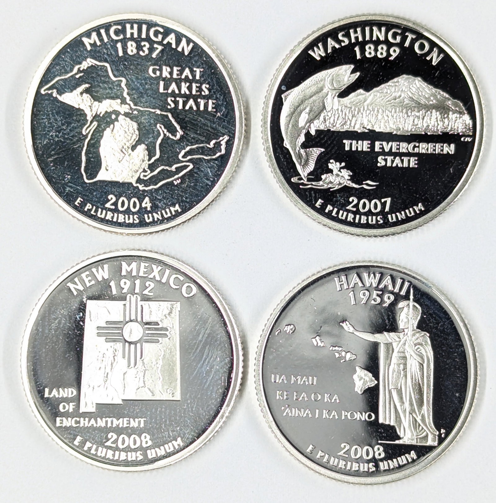 Lot of 4 Silver State Quarters - 2004 MI, 2007 WA, 2008 NM, 2008 HI: Silver