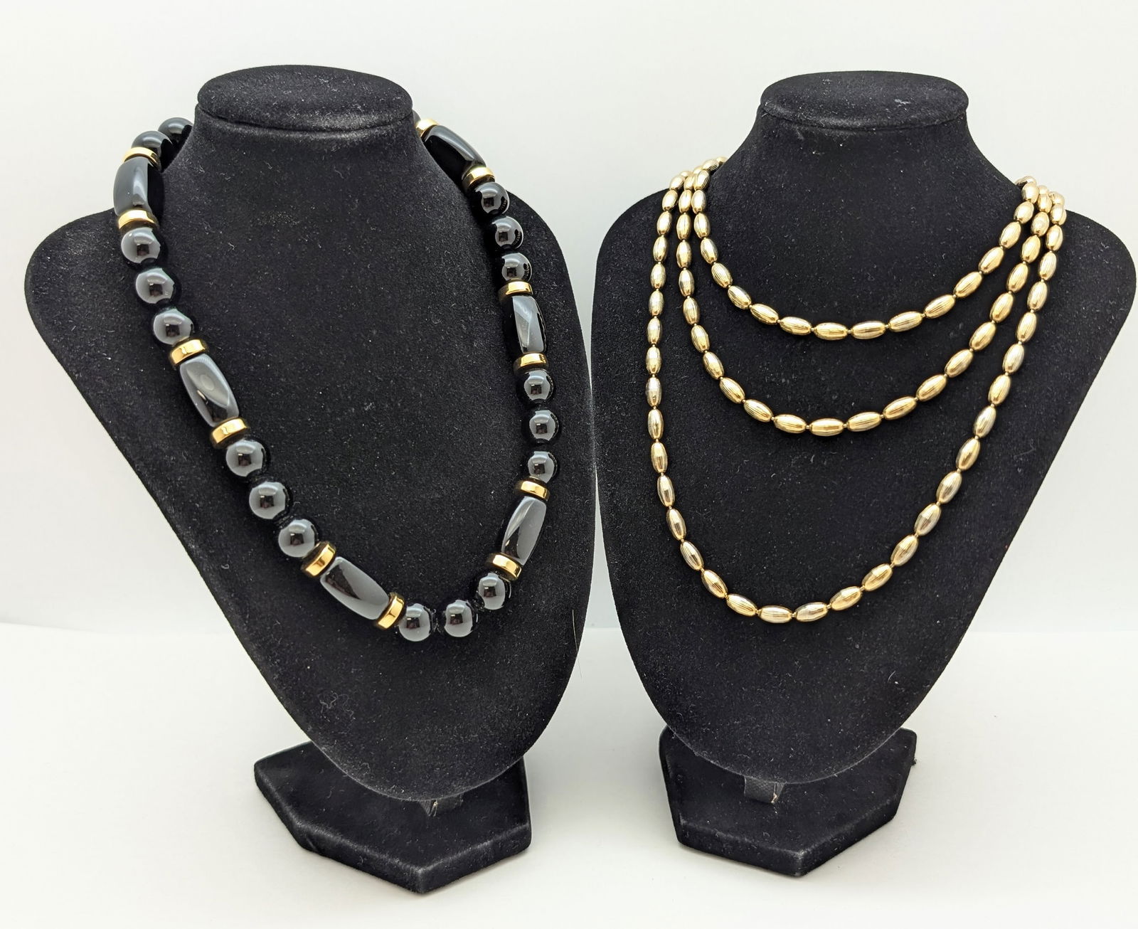 Lot of 2 Beaded Ladies Necklaces- Black, Gold toned: Black-16in Gold Toned- 26in