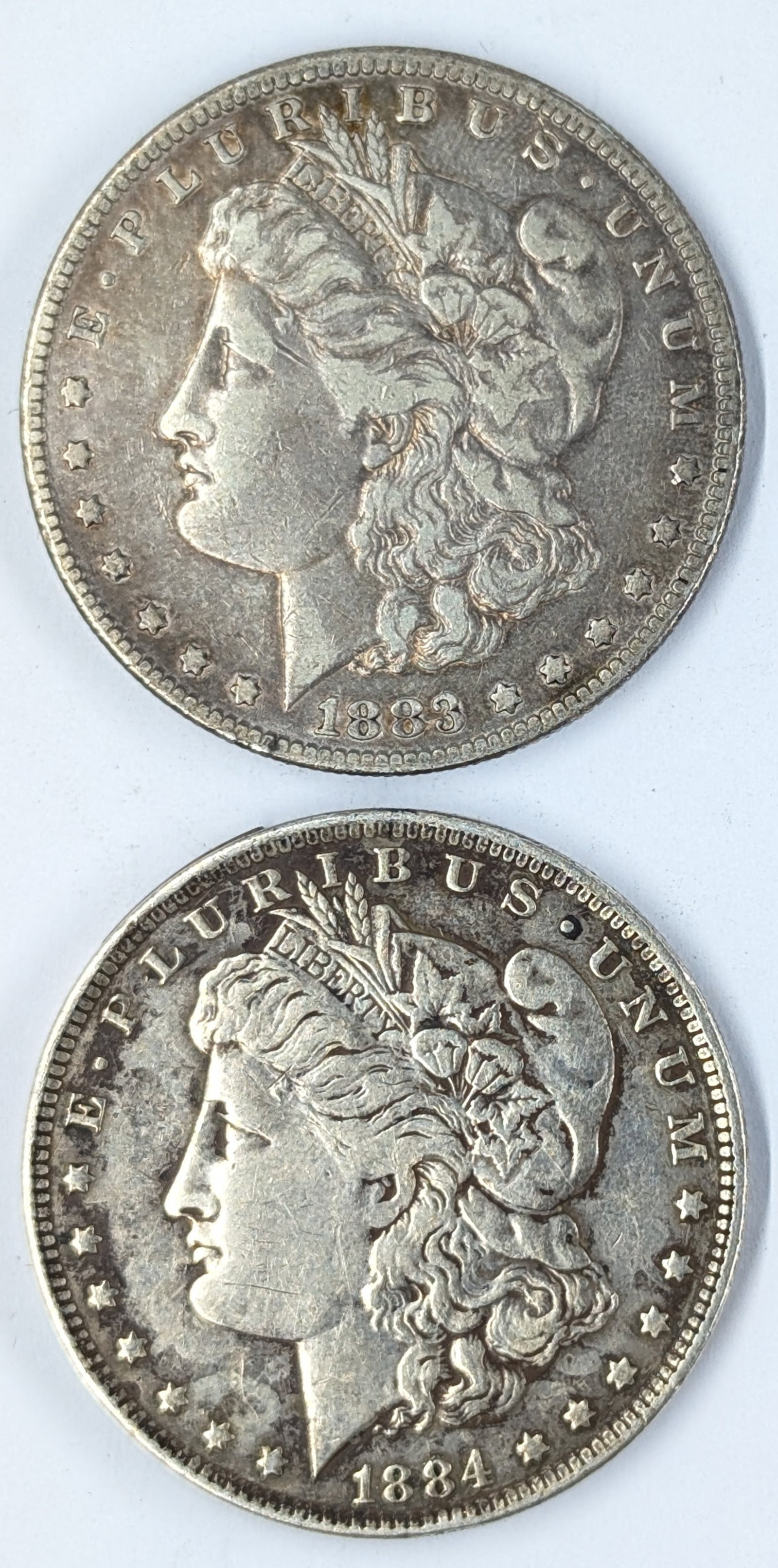 Lot of 2 Morgan Silver Dollars - 1883, 1884-O: Silver