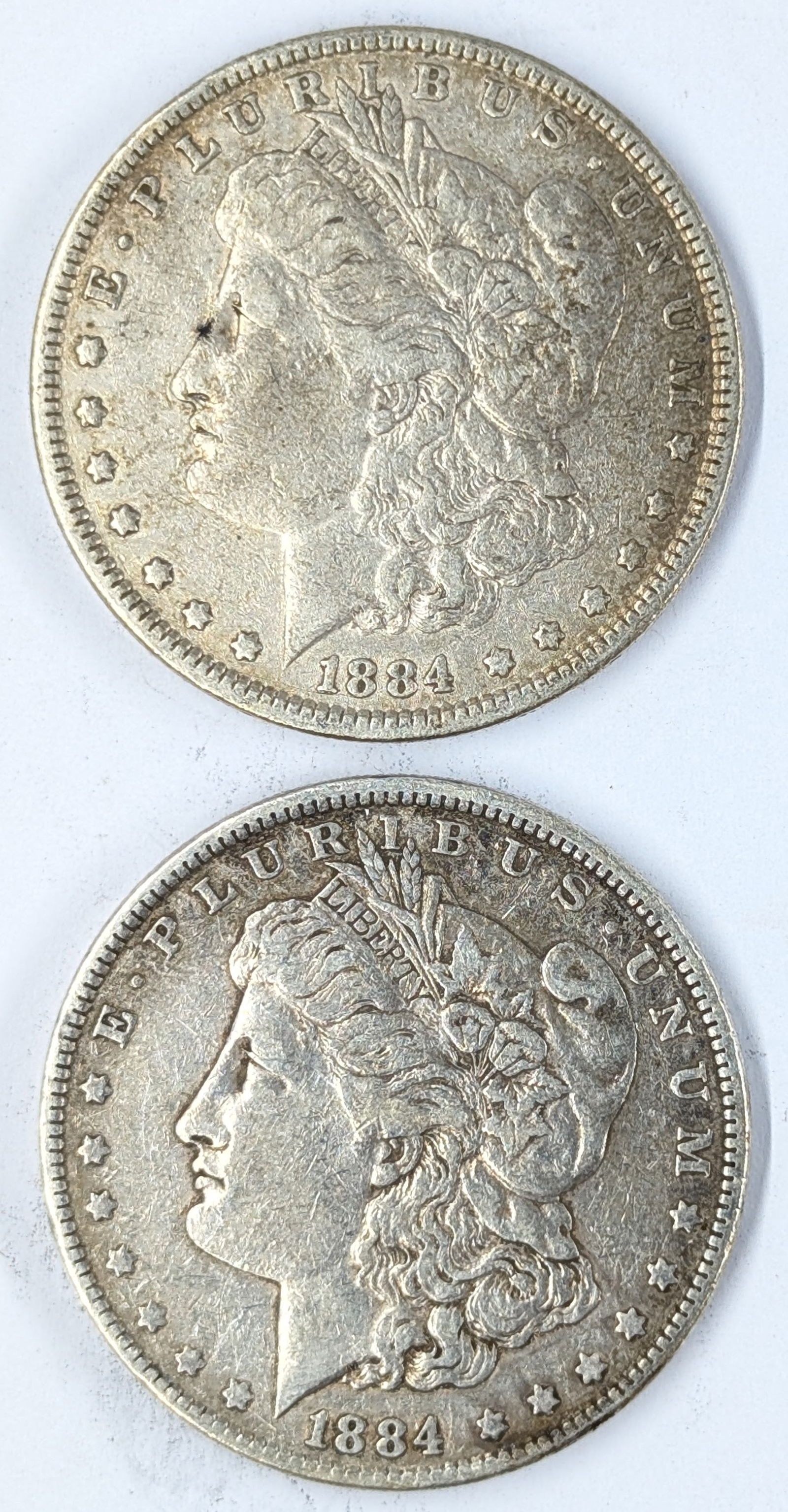 Lot of 2 Morgan Silver Dollars - Both 1884 (1 of 2)