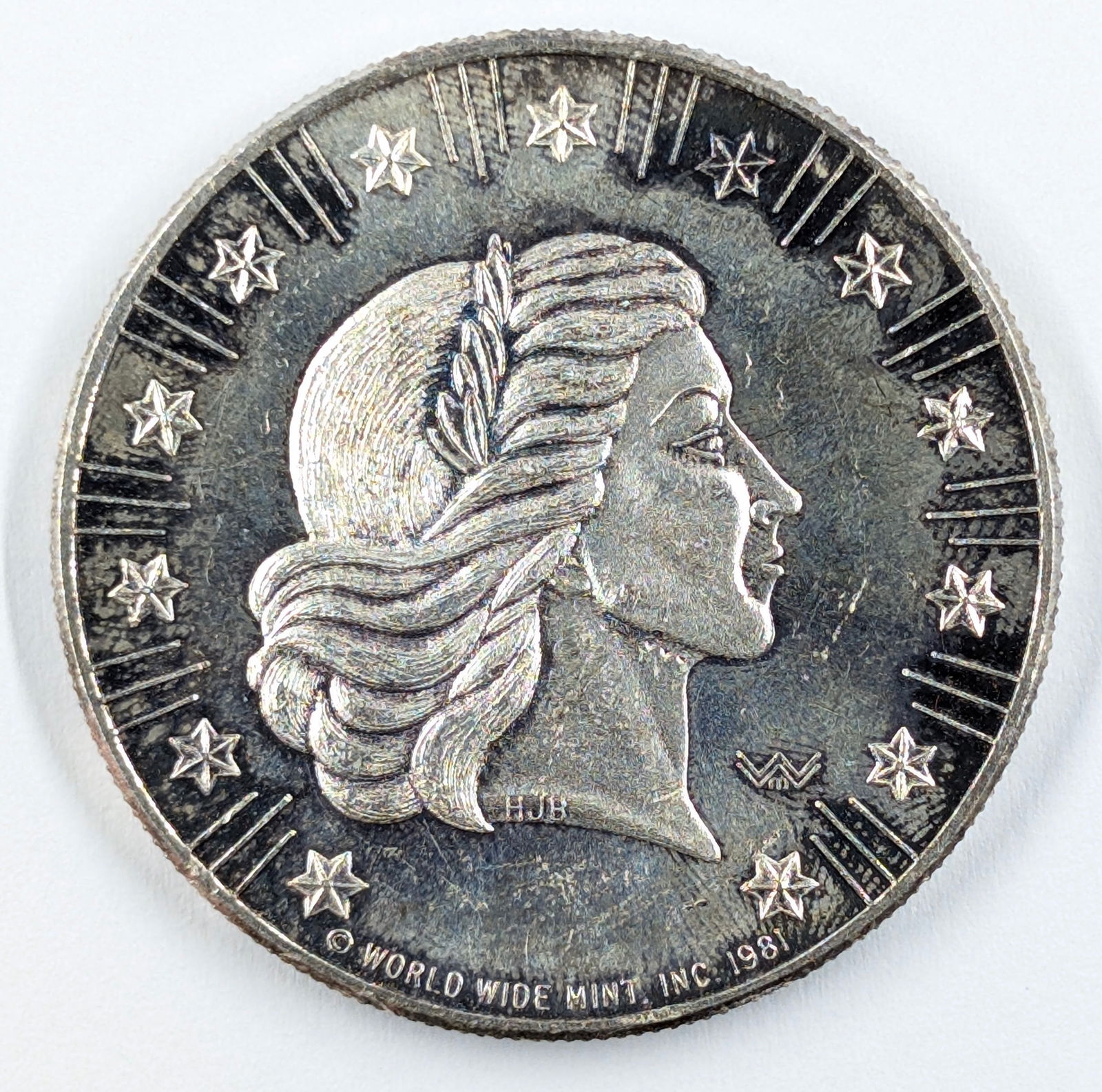 1 Ounce Fine .999 Silver Round-1981 World Wide Mint: _