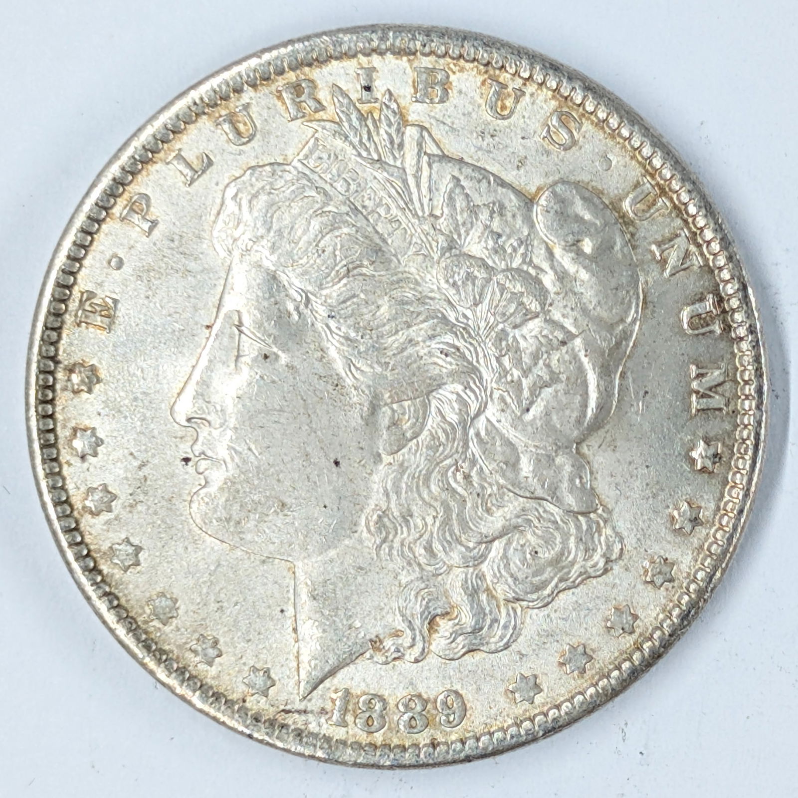 1889 Morgan Silver Dollar: _