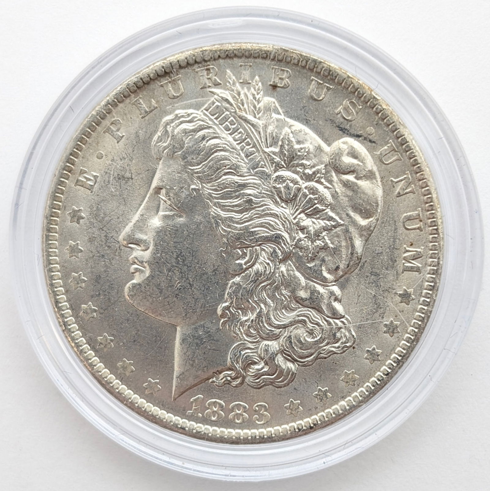 1883-O Morgan Silver Dollar: Silver