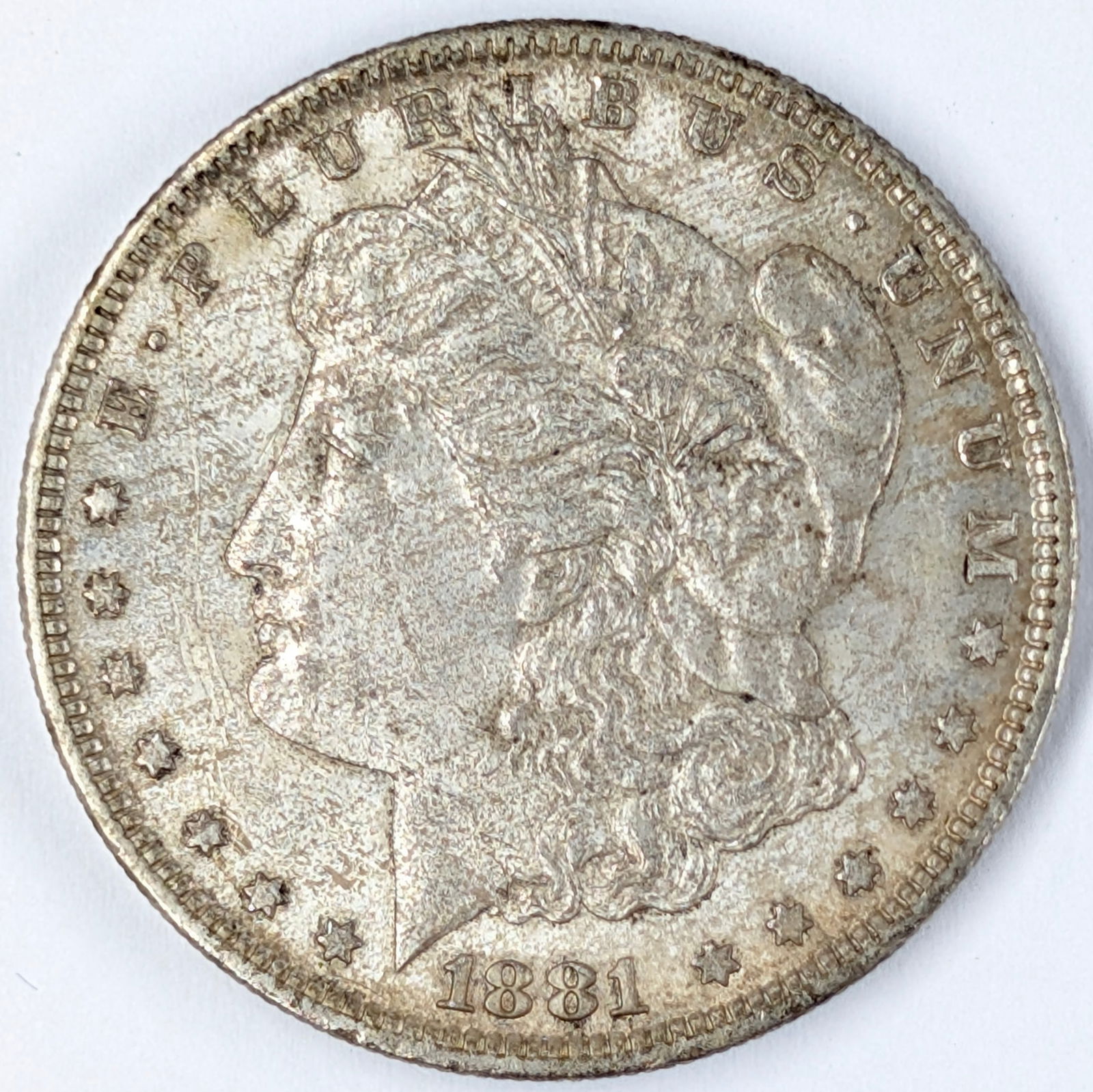 1881-O Morgan Silver Dollar: Silver
