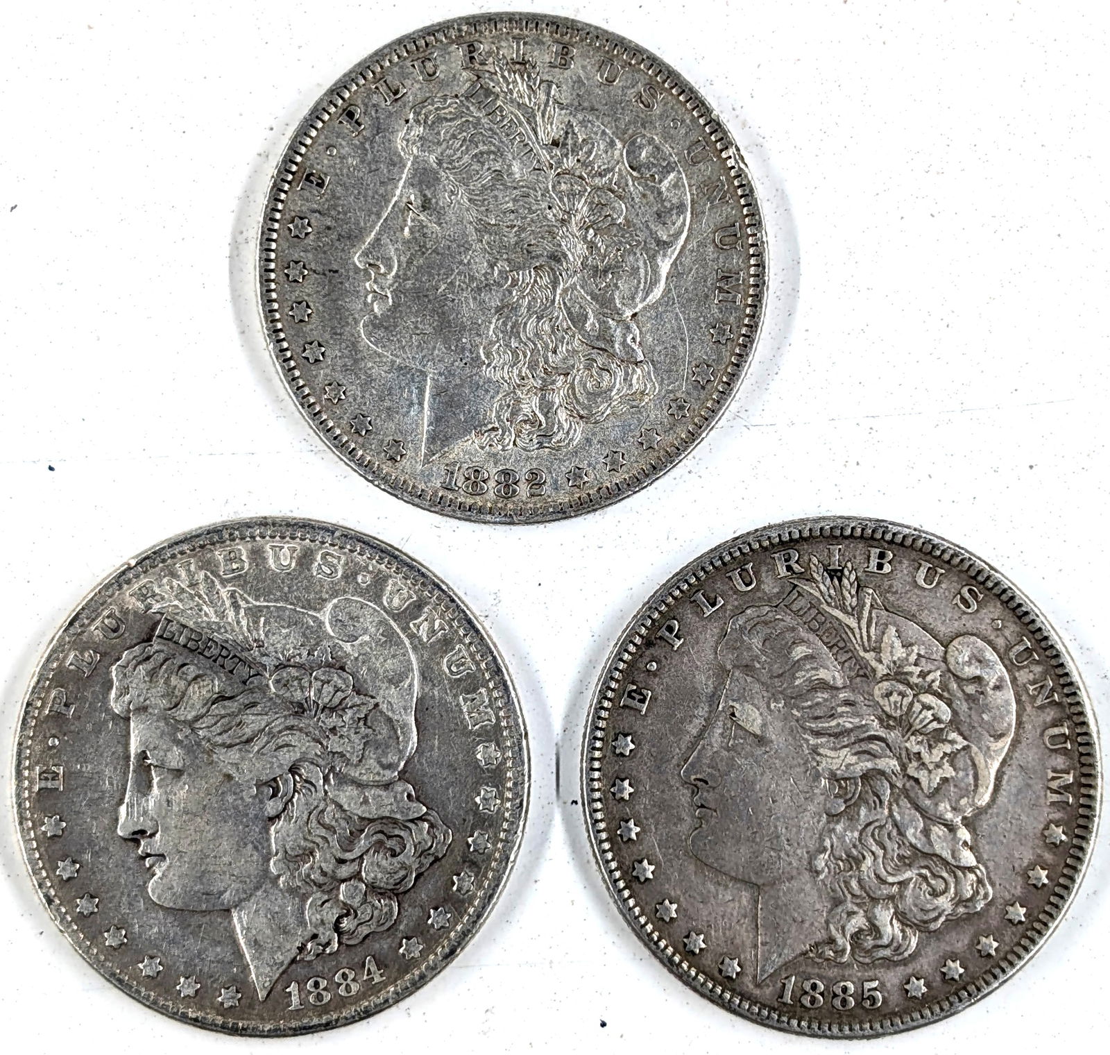 Lot of 3 Morgan Silver Dollars - 1882-O, 1884, 1885 (1 of 2)
