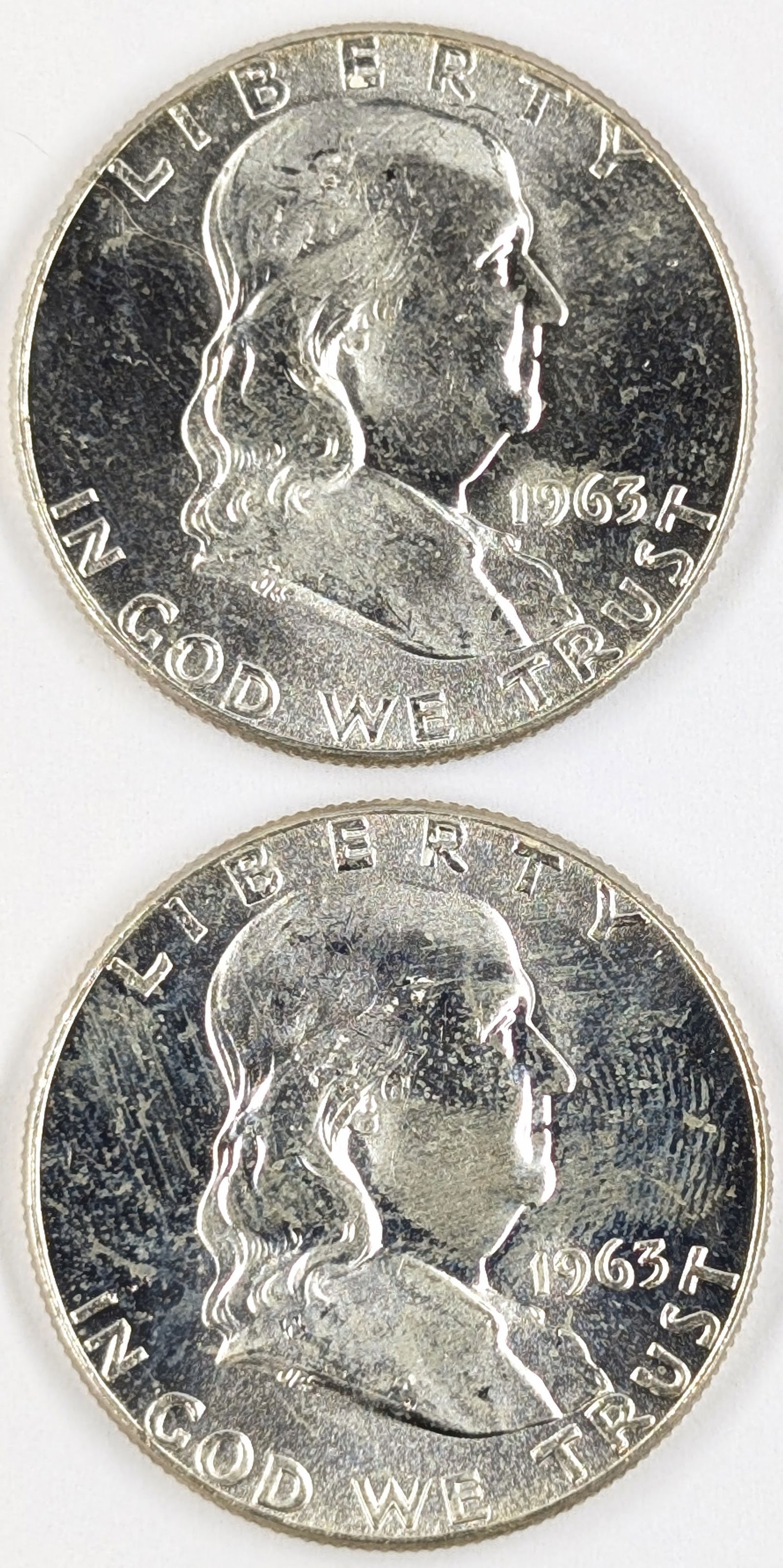 Lot of 2 Silver Franklin Half Dollars - Both 1963 AU (1 of 2)