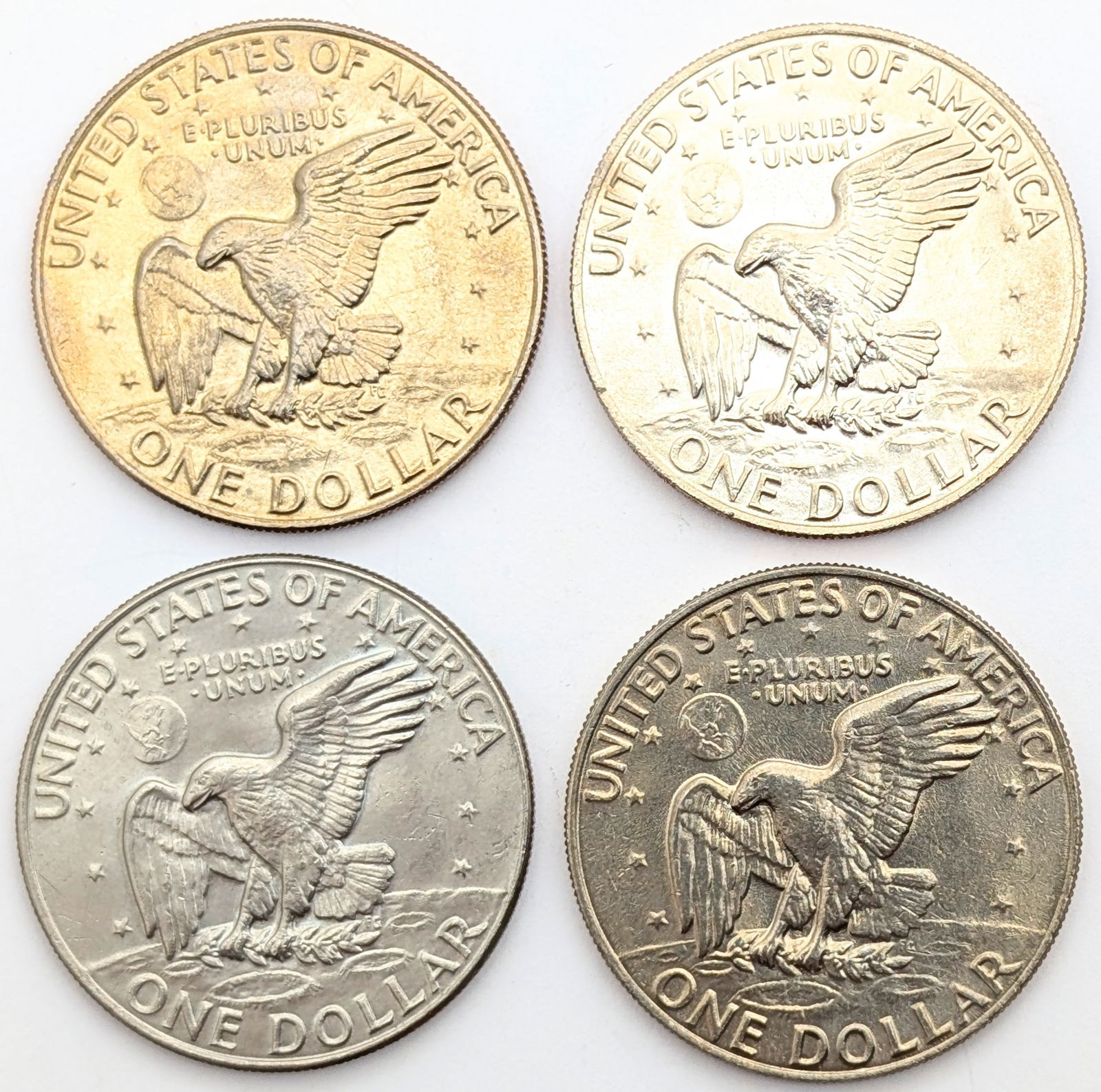 Lot of 4 Uncirculated Eisenhower "Ike" Dollars - 1973-1974 - Some Toned - 2