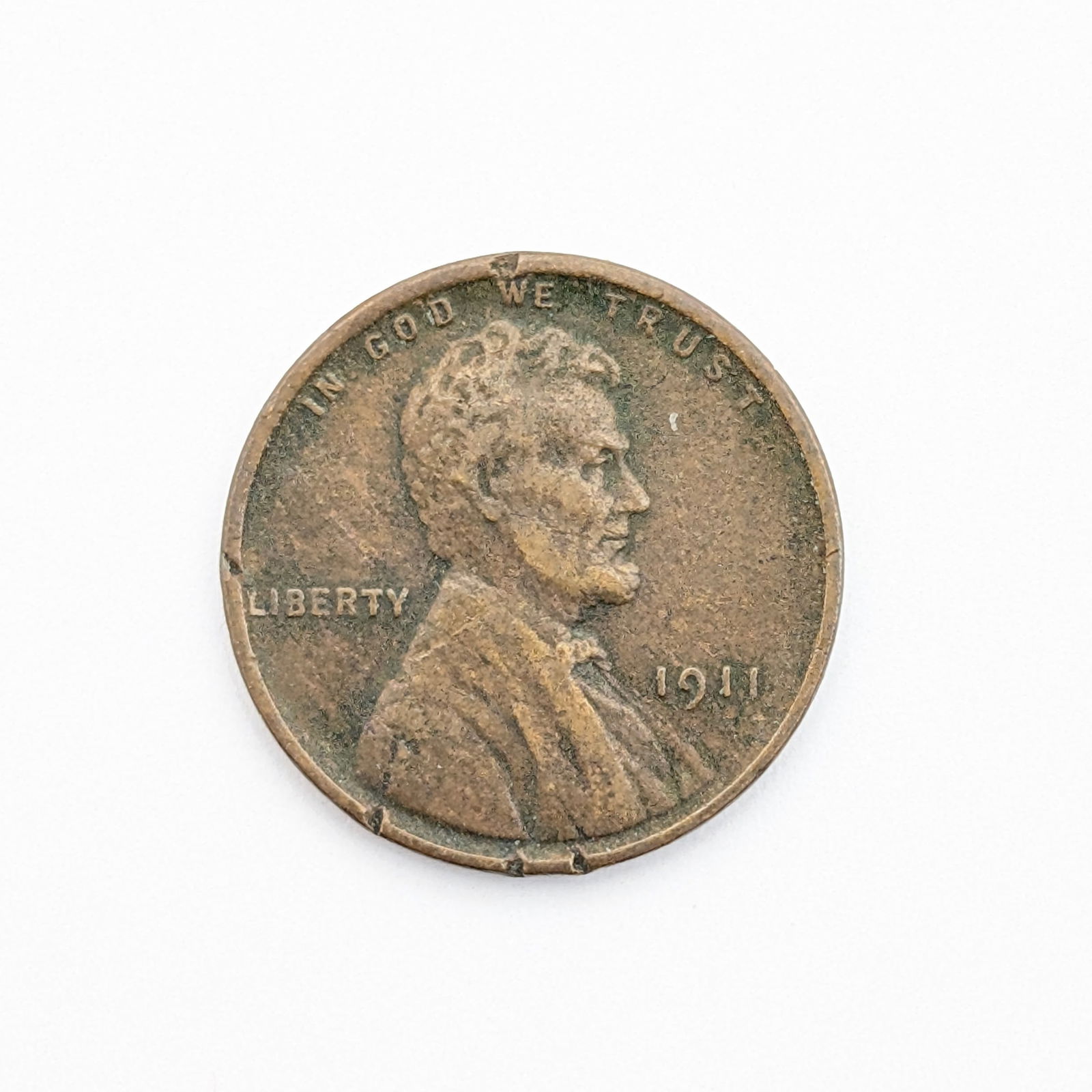 1911 Wheat Cent: Rim damage