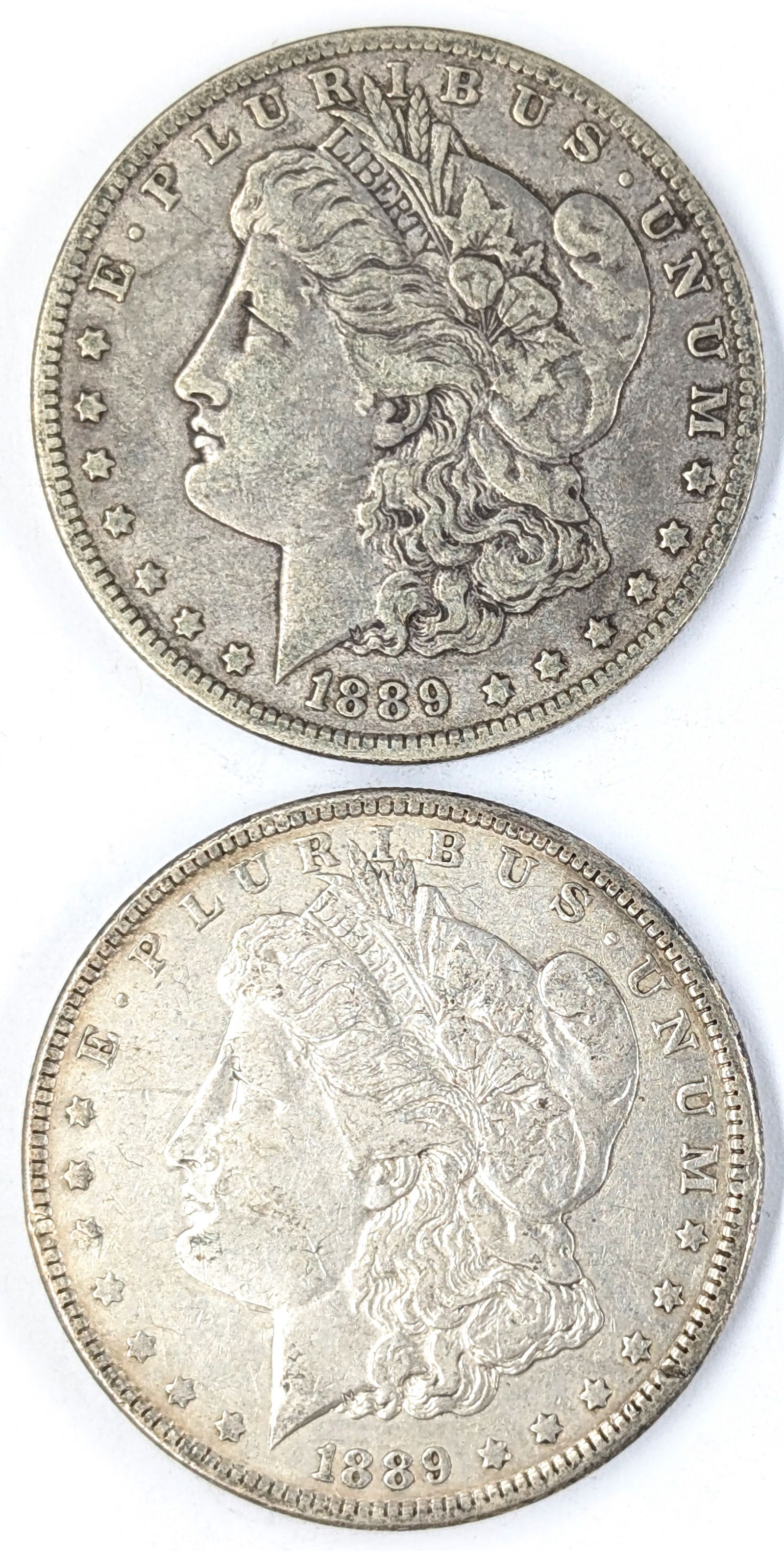 Lot of 2 Morgan Silver Dollars- 1889 O&P (1 of 2)