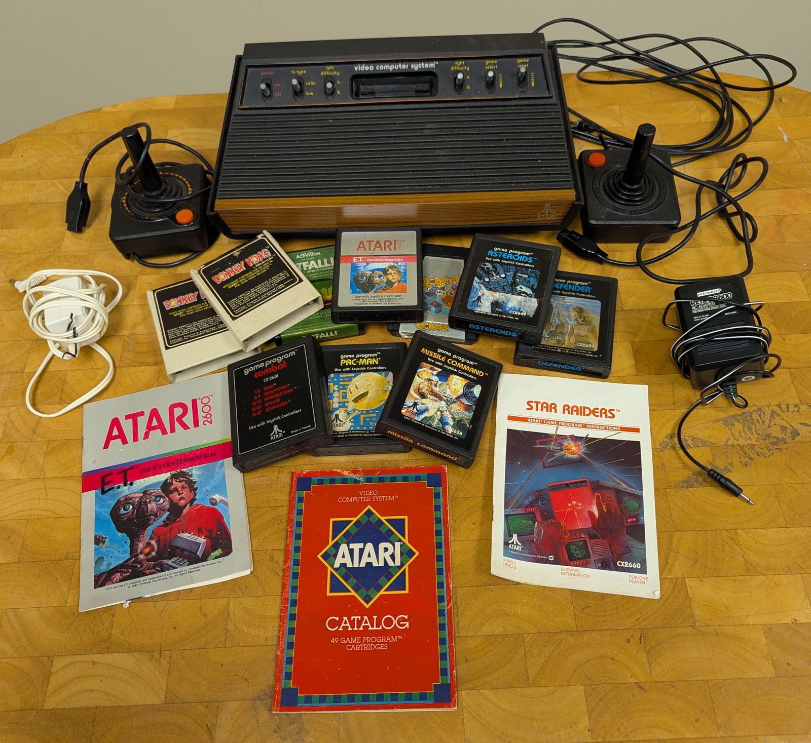 Atari 2600- Includes 2 Joysticks, and Games. - 2