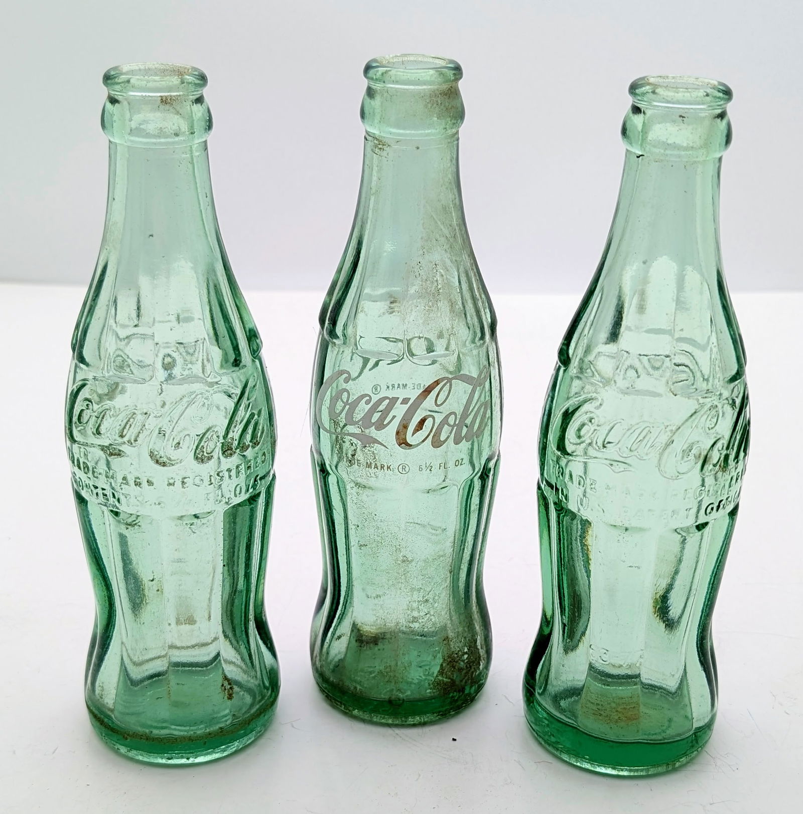 Lot of 3 Vintage Coca-Cola "Hobble Skirt" Shape Glass Bottles: Made in Columbia, Houston, Allendale