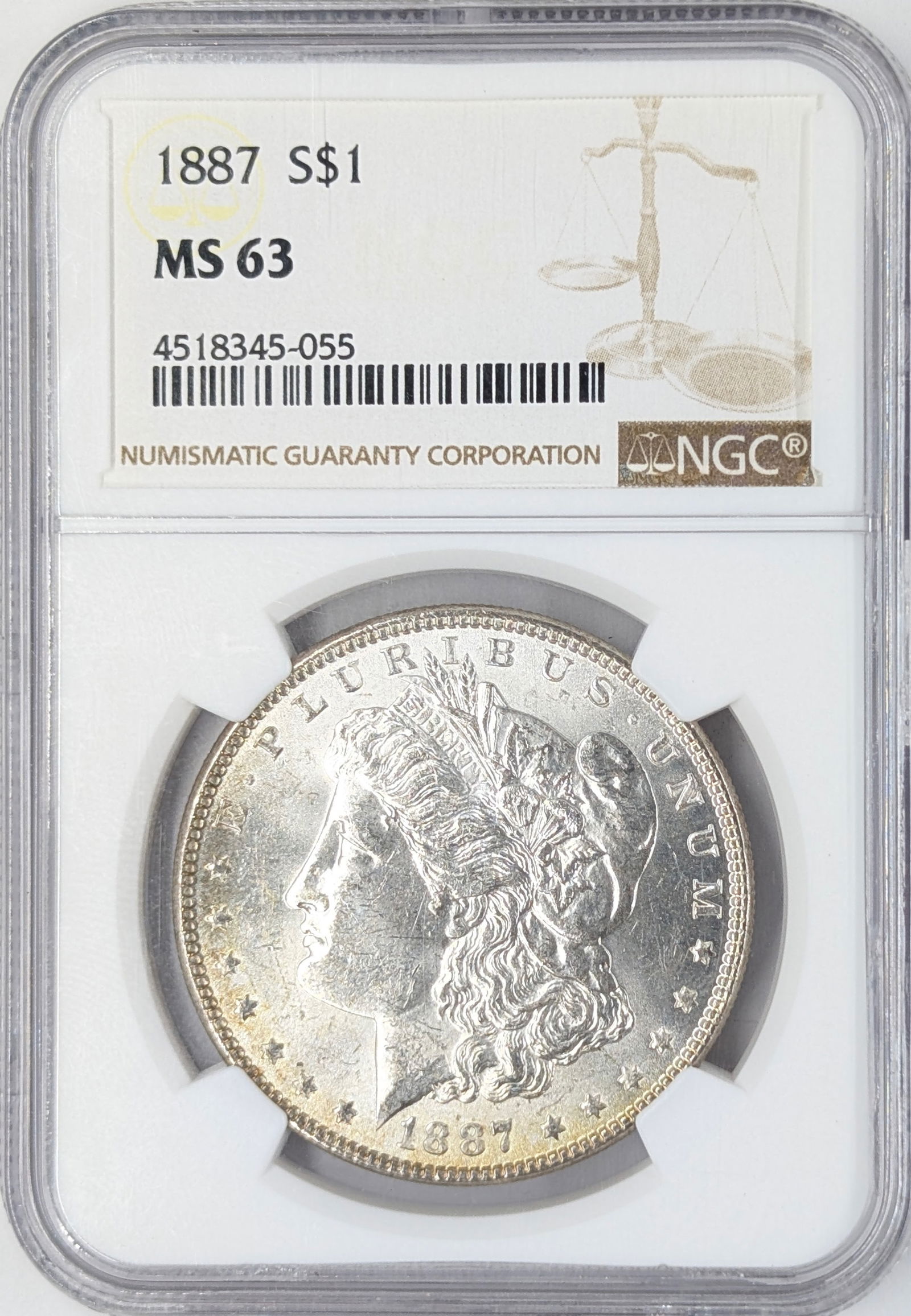 NGC 1887 MS63 Morgan Silver Dollar - Lightly Toned: Silver 