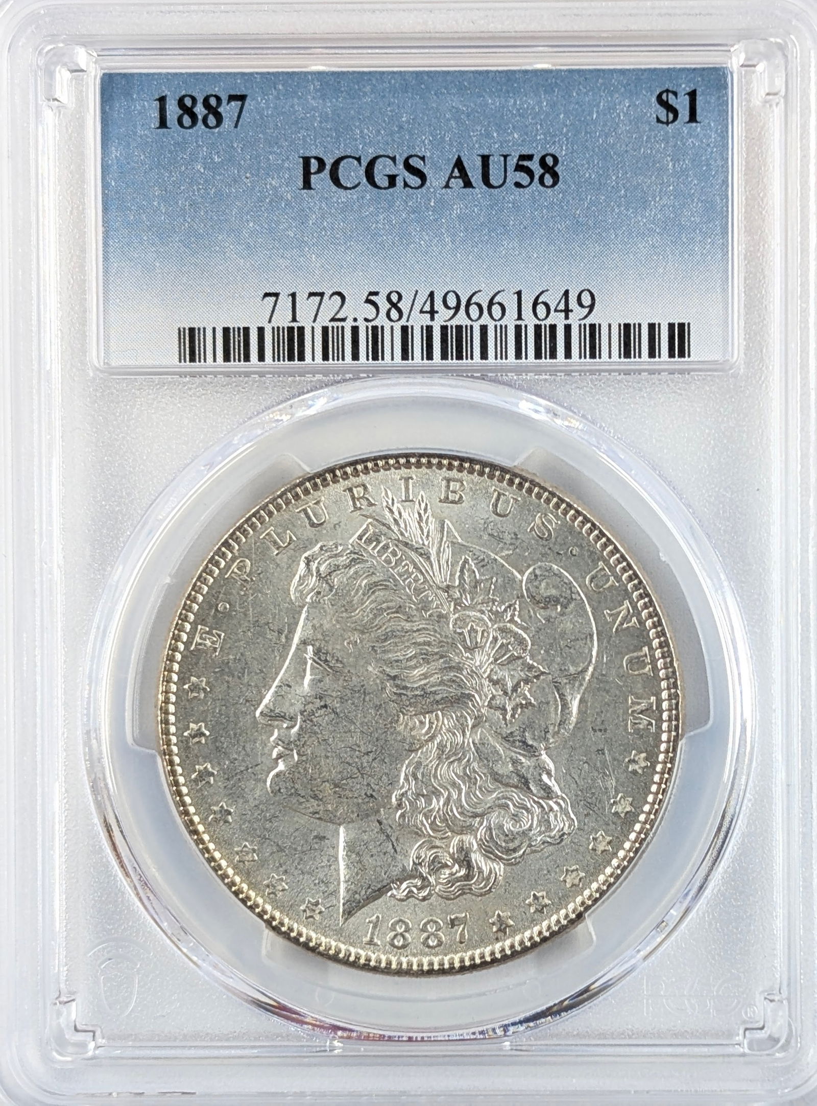PCGS 1887 AU58 Morgan Silver Dollar: Silver 
