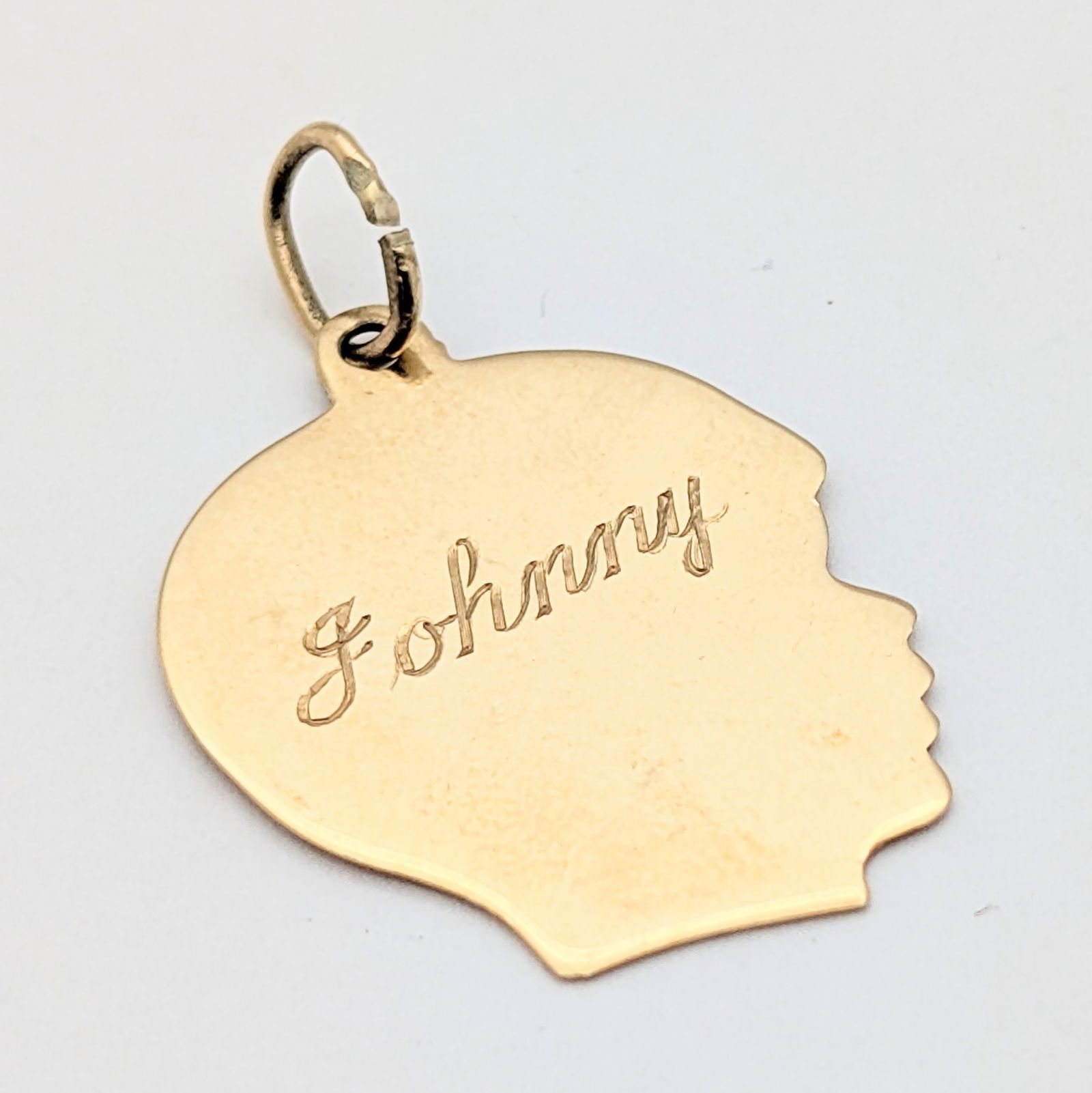 14K Gold Boy's Profile Charm - 2.23g: Both sides engraved on charm 