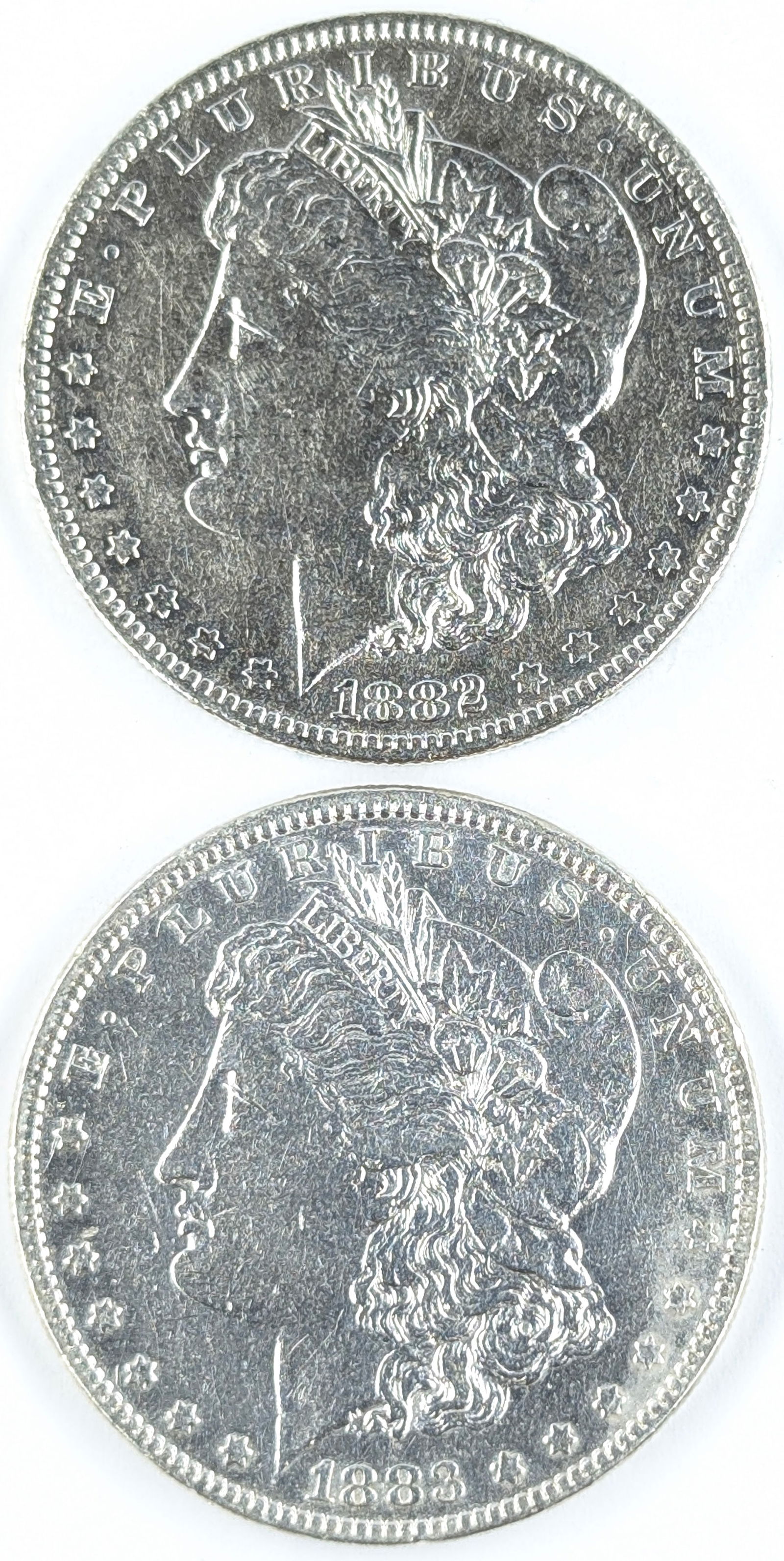 Lot of 2 Morgan Silver Dollars - 1882-O, 1883 (1 of 2)