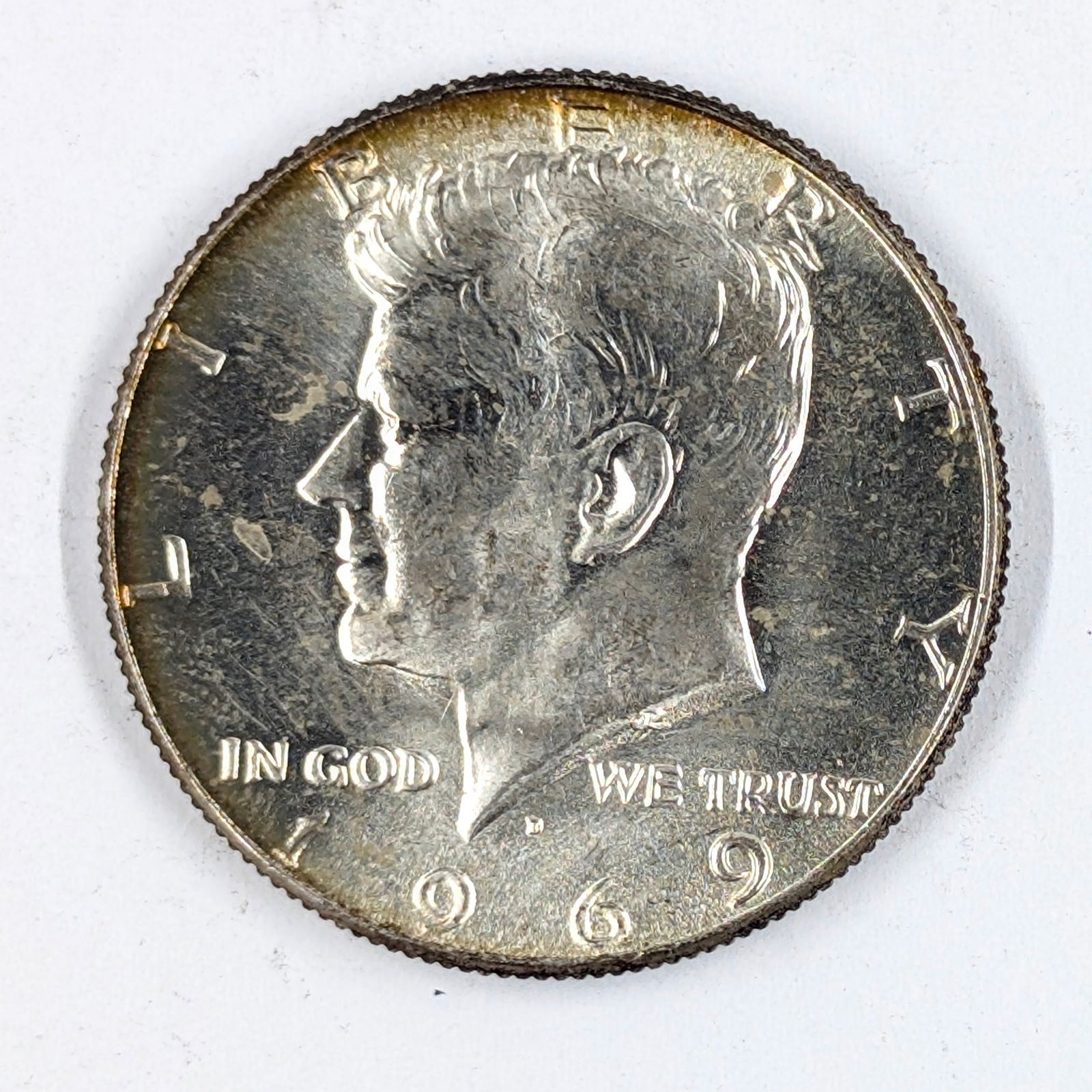 1969-D Silver John F Kennedy Half Dollar 40% Silver- Uncirculated, Toning on the Rim (1 of 3)