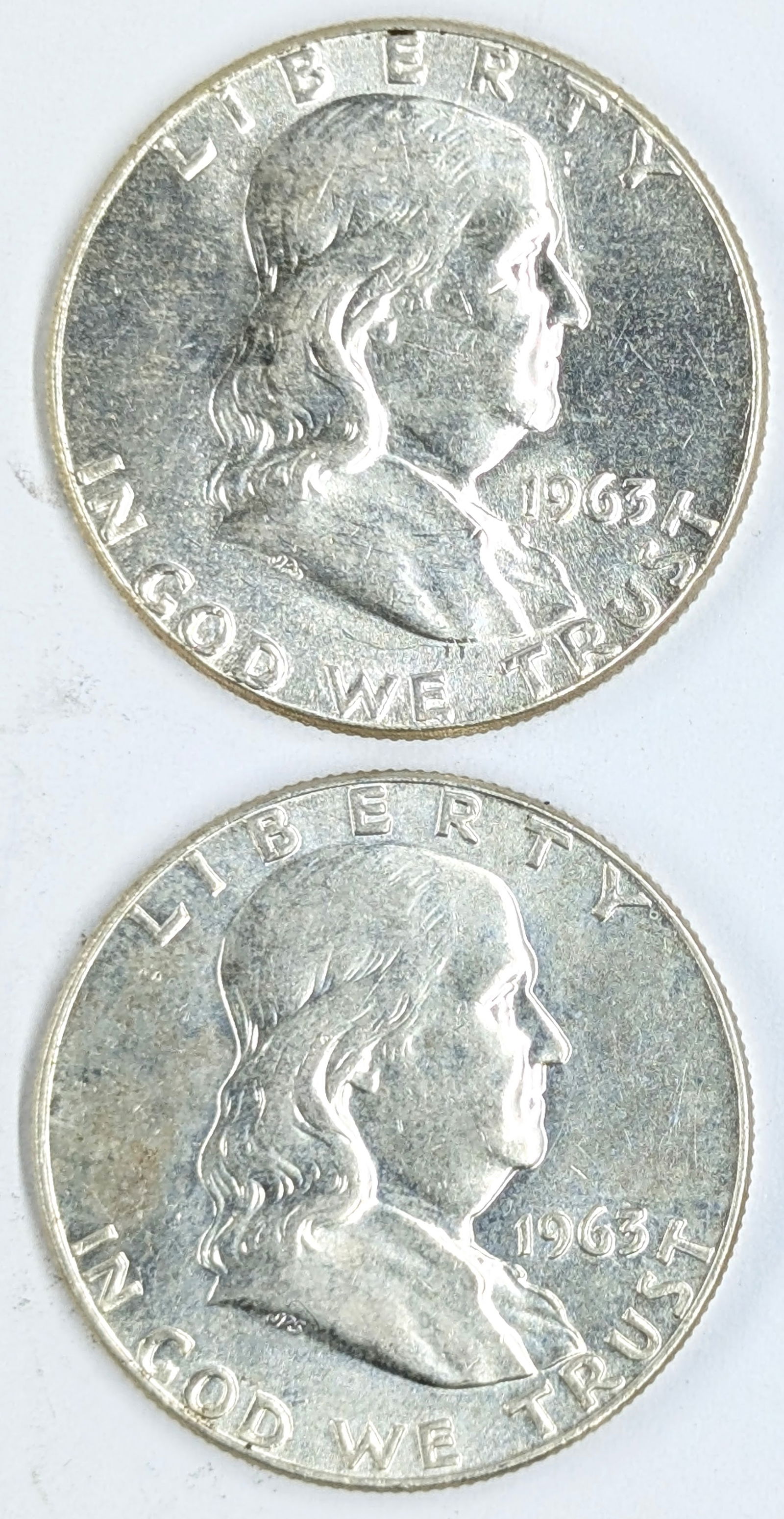 Lot of 2 Silver Franklin Half Dollars - 1963 P/D: _