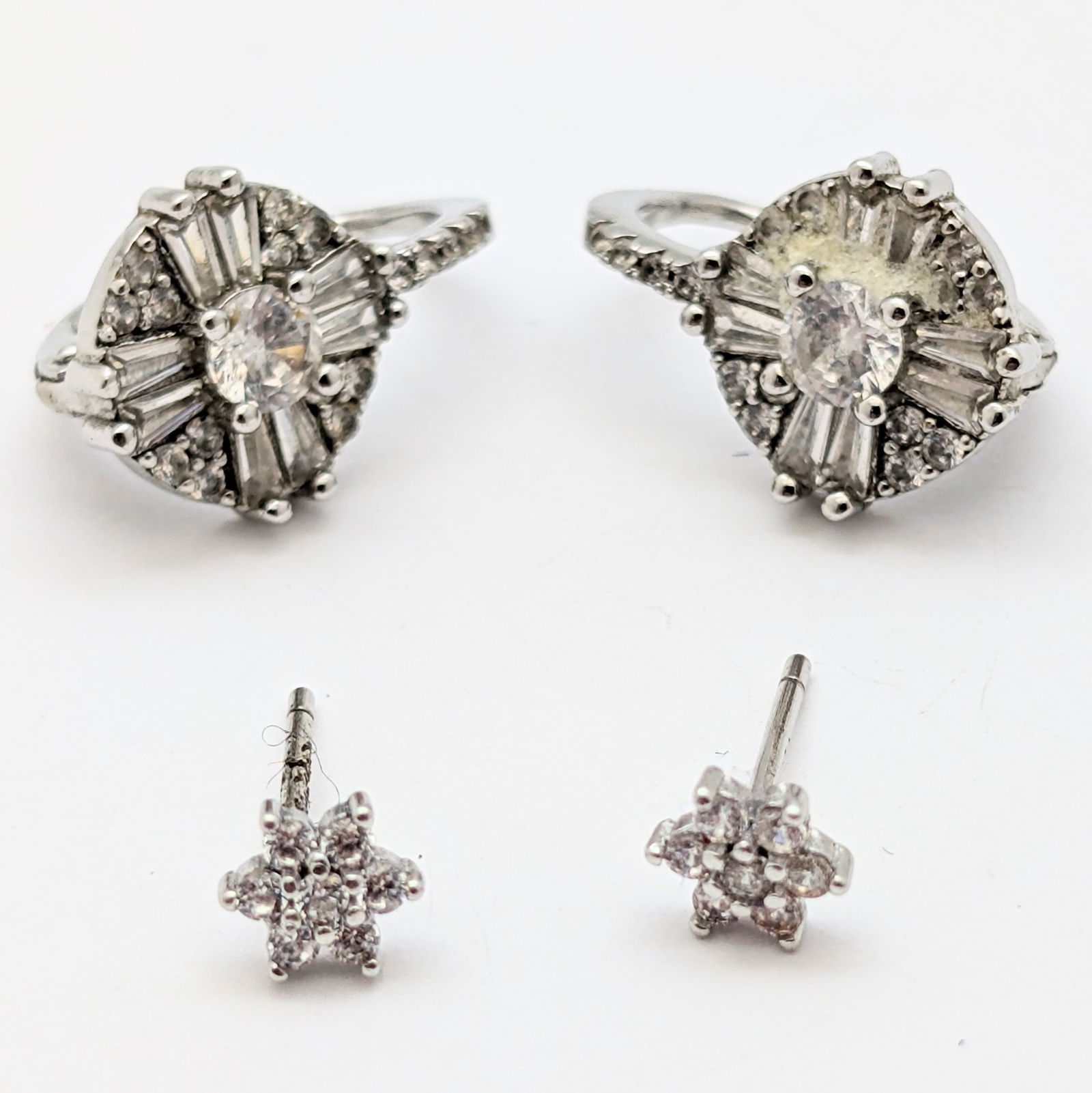 Lot of 2 Sterling Silver Cluster Rhinestone Ladies Earrings: The backs are missing on the pair of studs 