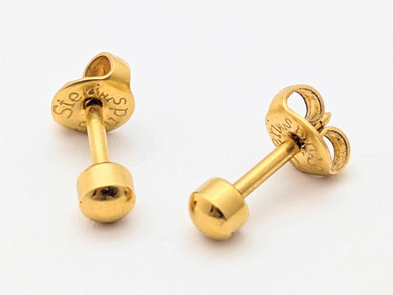 Steri Studs Gold tone Ladies Earrings: Jewelry 