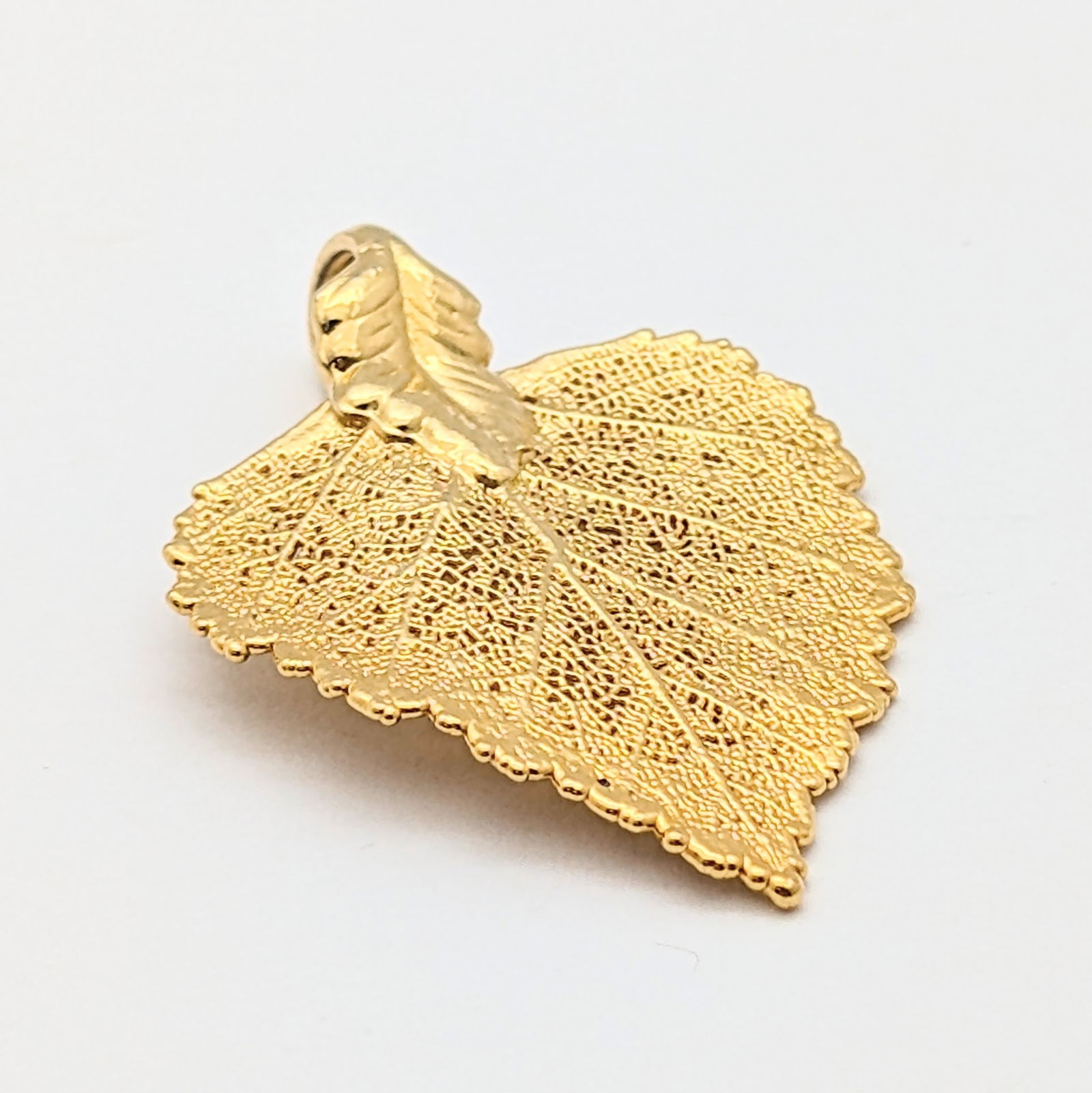 Gold tone Textured Leaf Pendant: Jewelry 