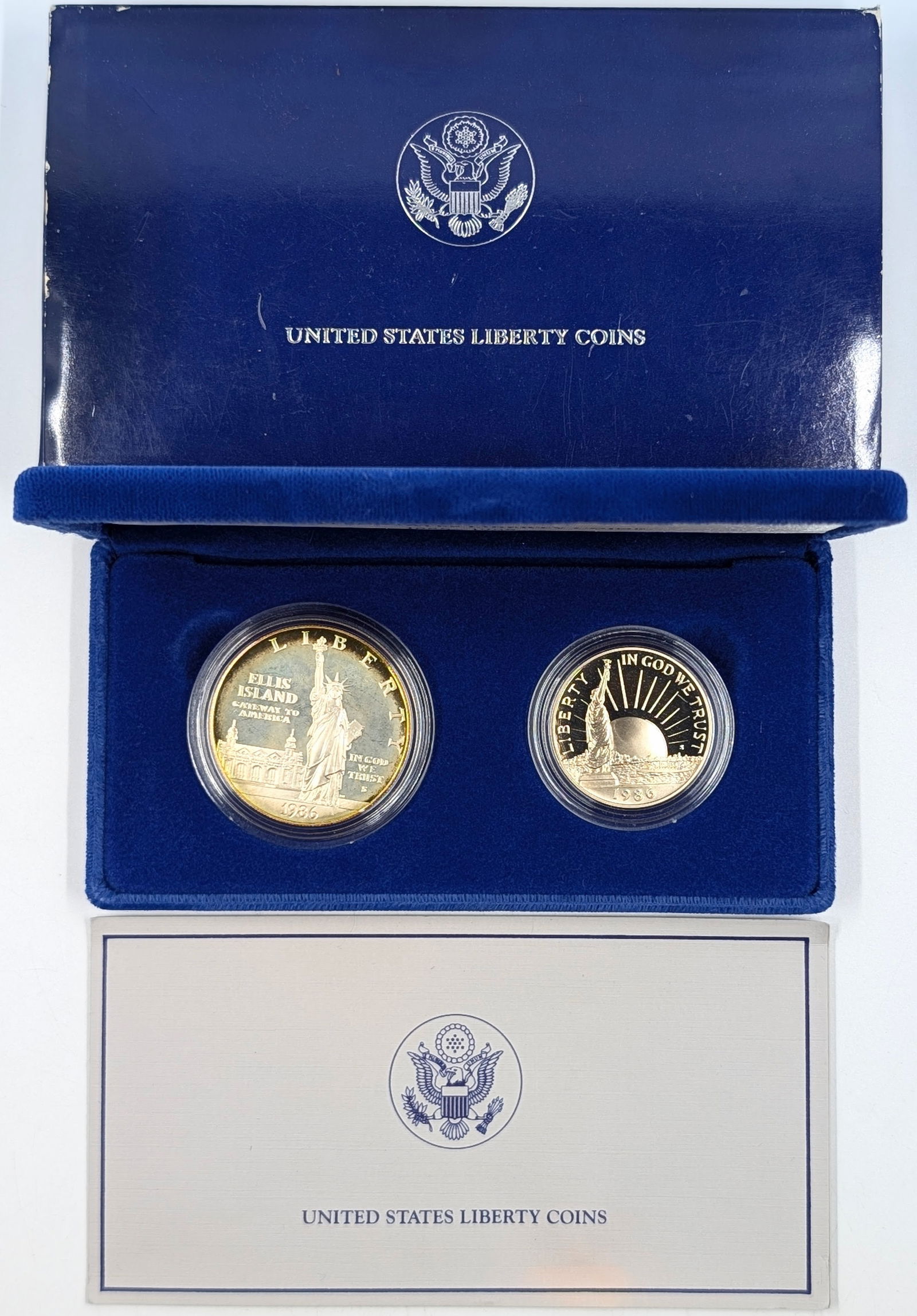 1986 US Liberty 2-Coin Uncirculated Set w/ Silver Toned Dollar: Only the dollar is silver 