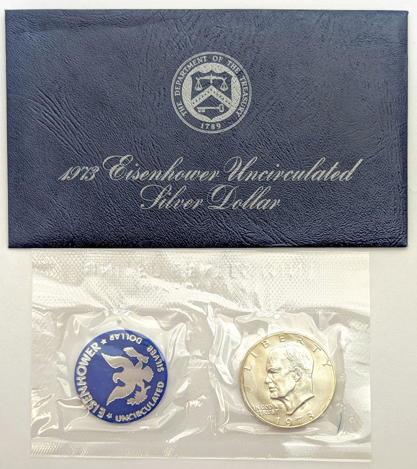 1973 Eisenhower " Ike" Uncirculated Silver Dollar: _ 