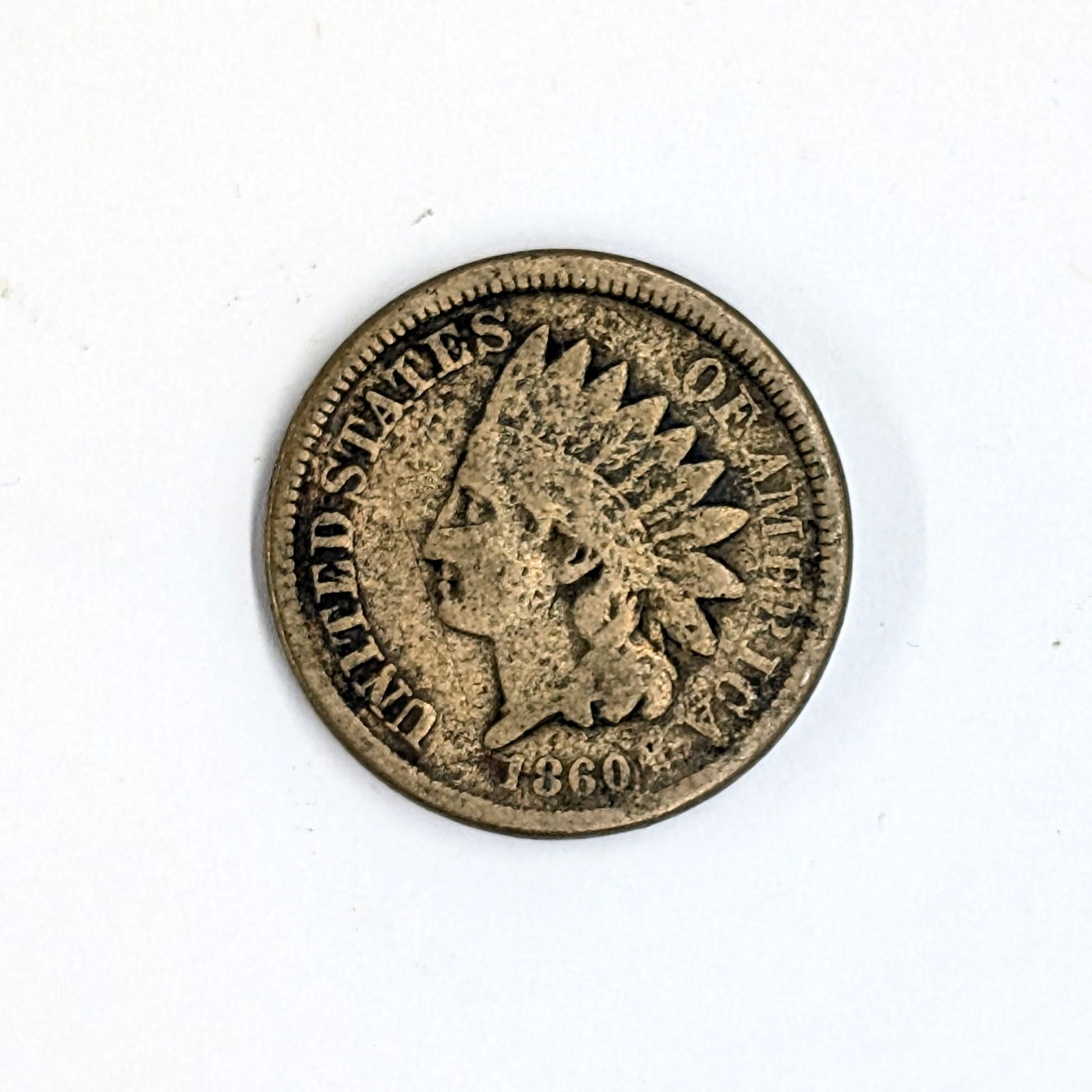 1860 Indian Head Cent: _ 