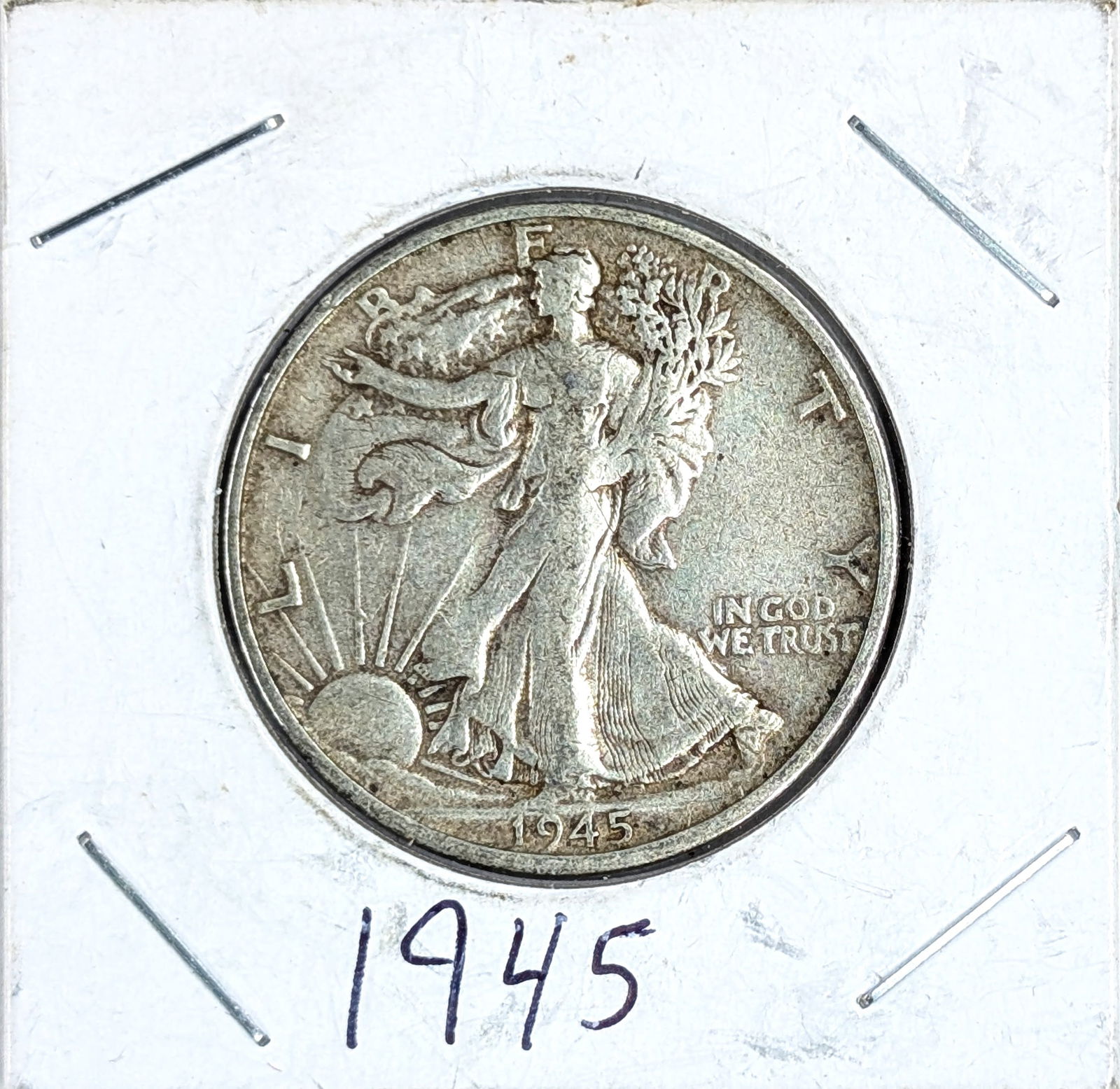 1945 Silver Walking Liberty Half Dollar: _ 