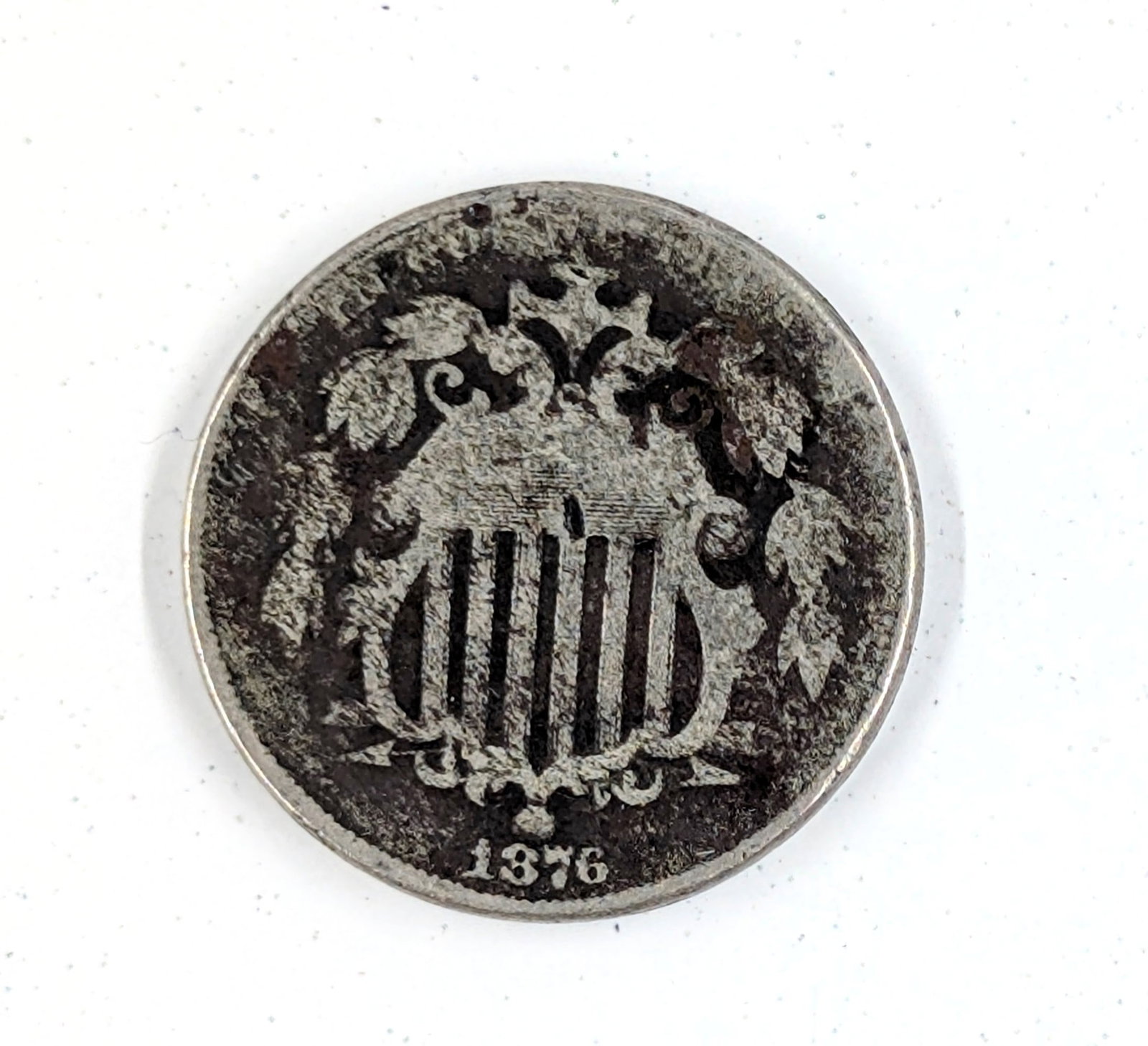1876 Shield Nickel: _ 