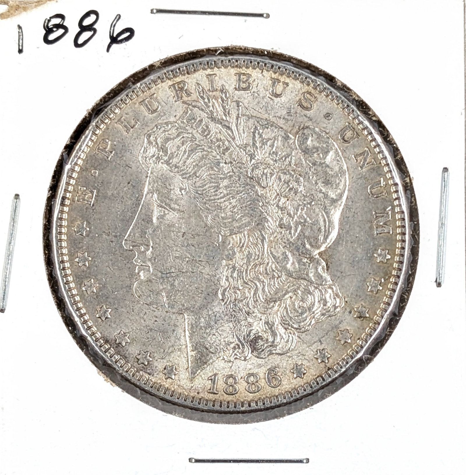 1886 Morgan Silver Dollar: _ 