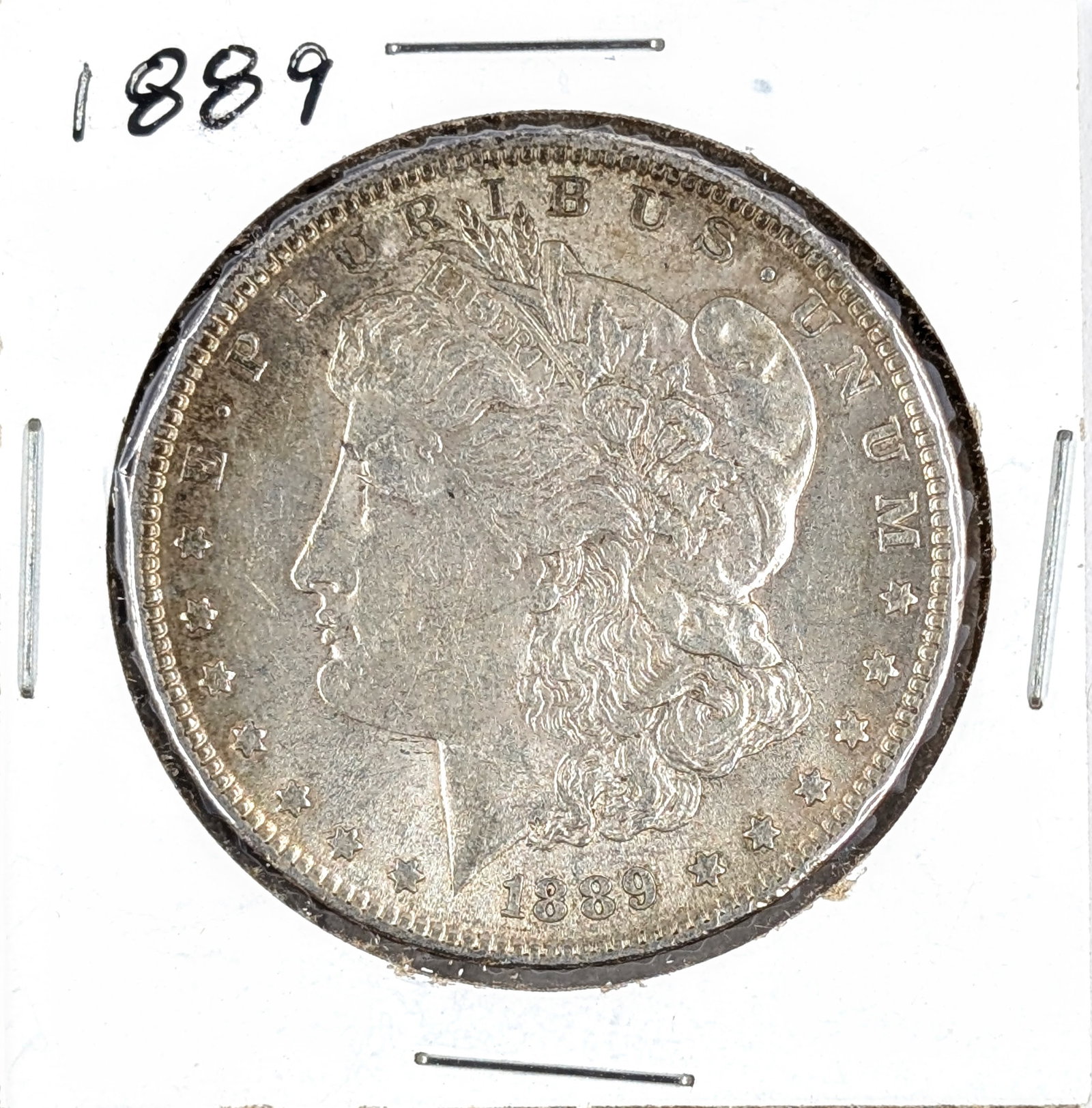 1889 Morgan Silver Dollar: _ 