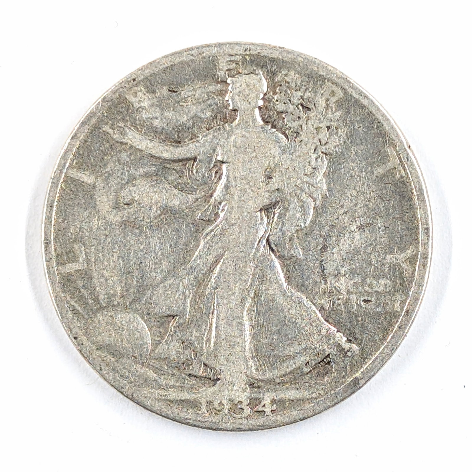 1934 Silver Walking Liberty Half Dollar: _ 