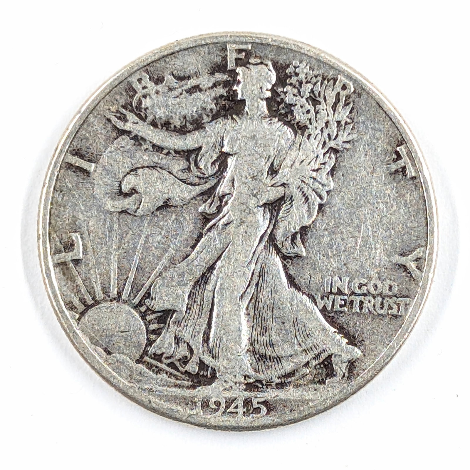 1945 Silver Walking Liberty Half Dollar: _ 