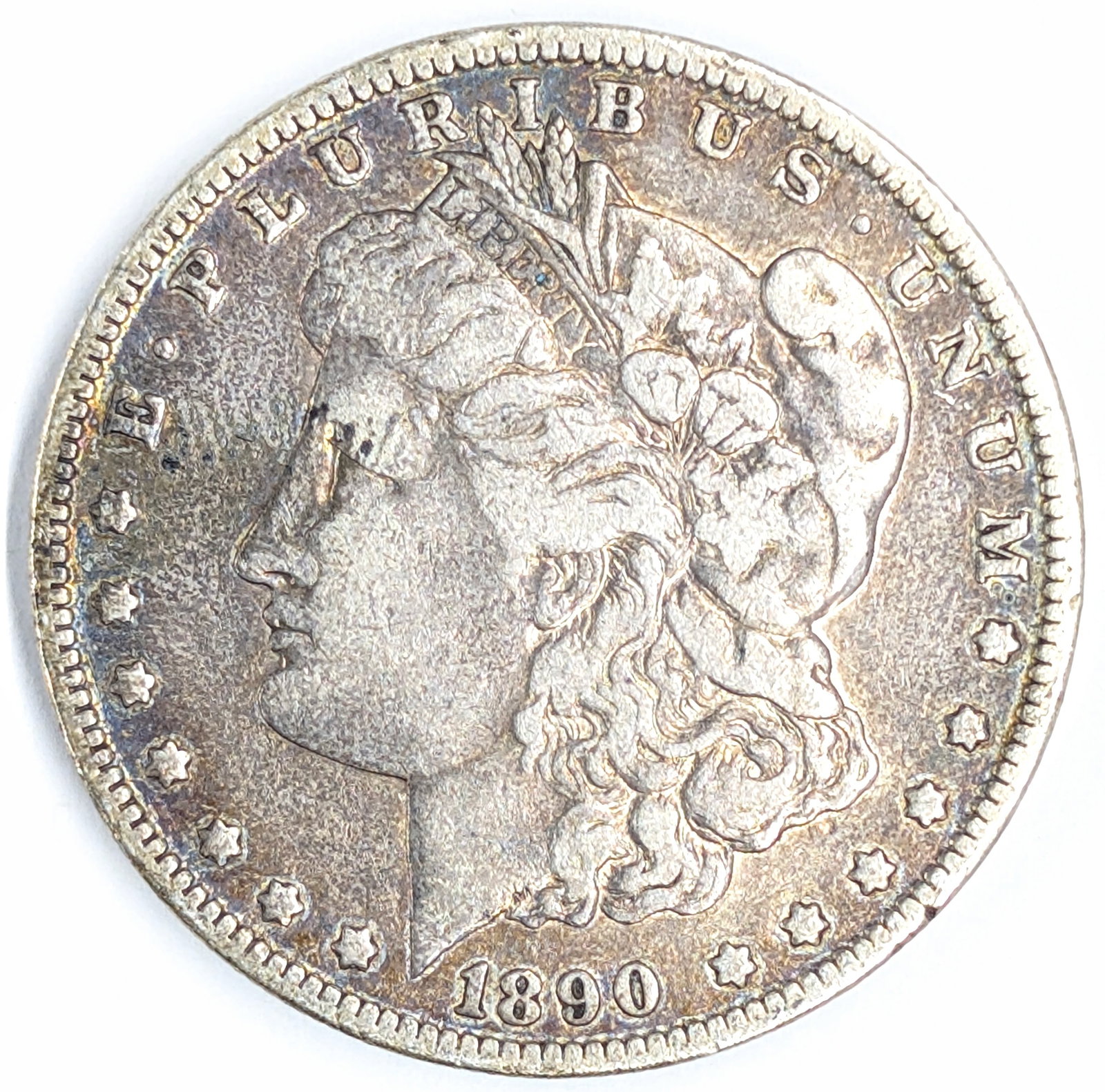 1890-O Morgan Silver Dollar- Toned (1 of 2)