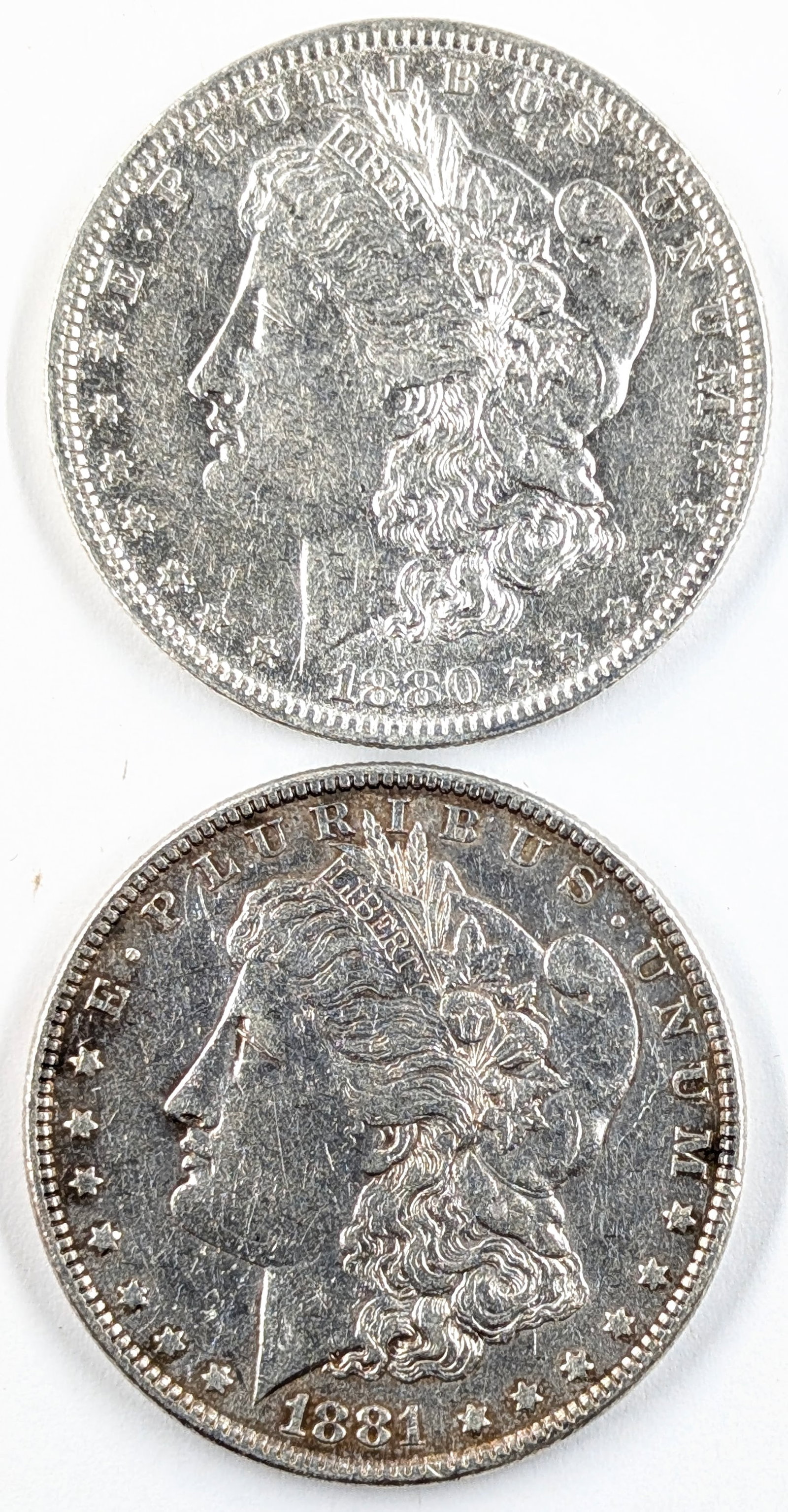 Lot of 2 Morgan Silver Dollars- 1880-O, 1881 (1 of 2)