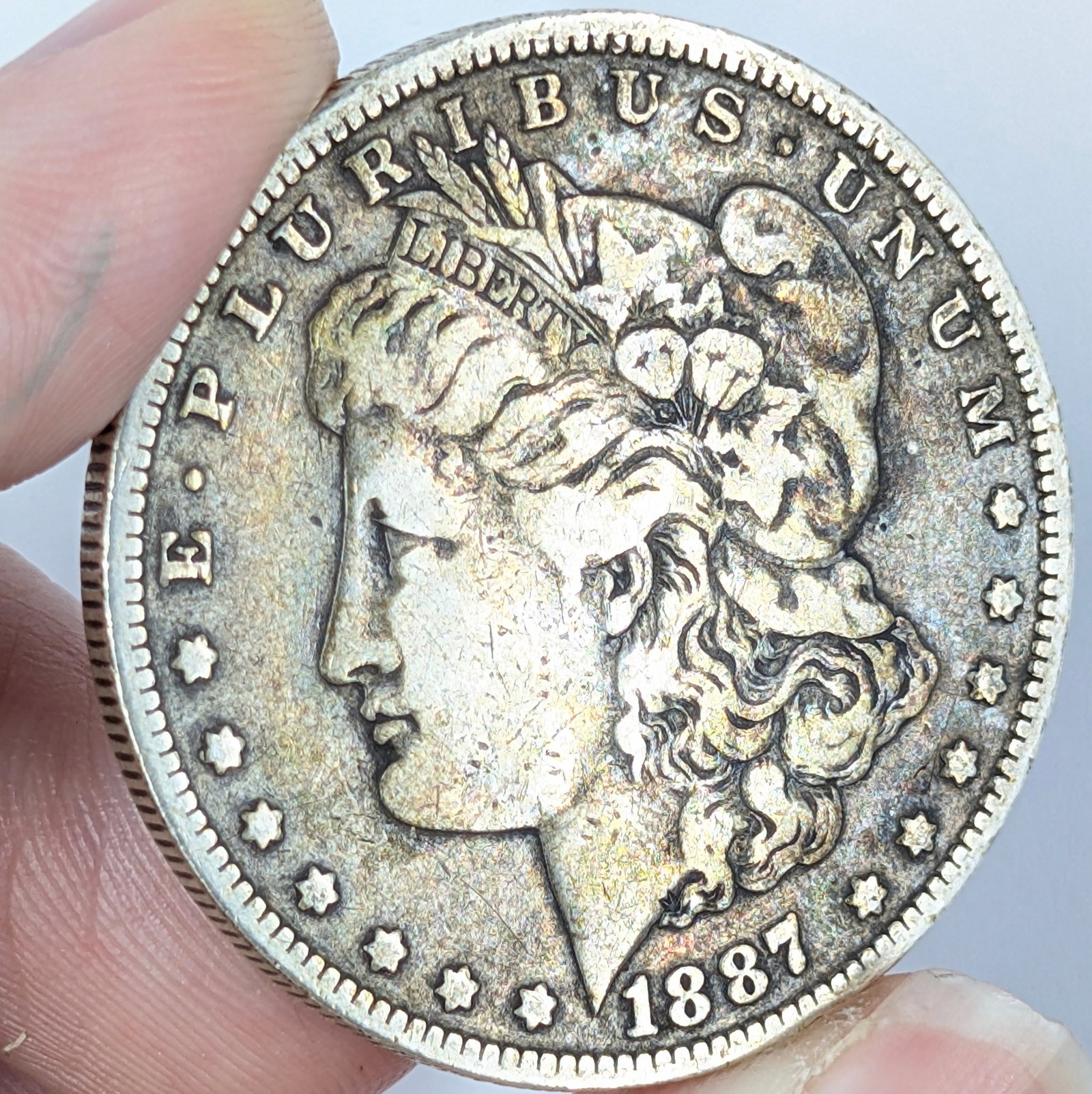 1887-O Morgan Silver Dollar - Toned (1 of 3)